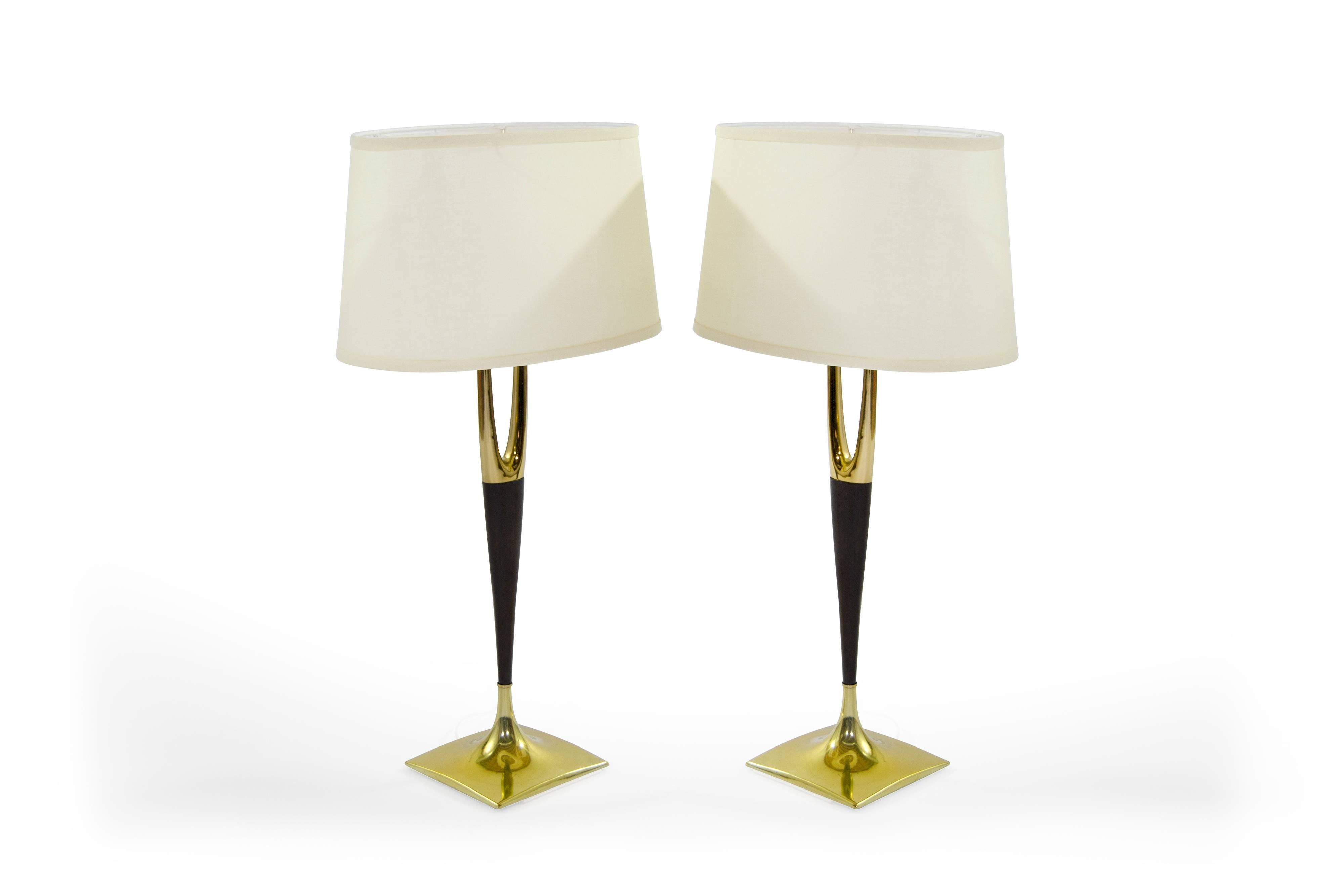 Fully restored pair of brass and walnut table lamps by Laurel Lamp Company, circa 1950s.

Brass and walnut have been fully restored. Newly rewired as well as fitted with new UL listed sockets.