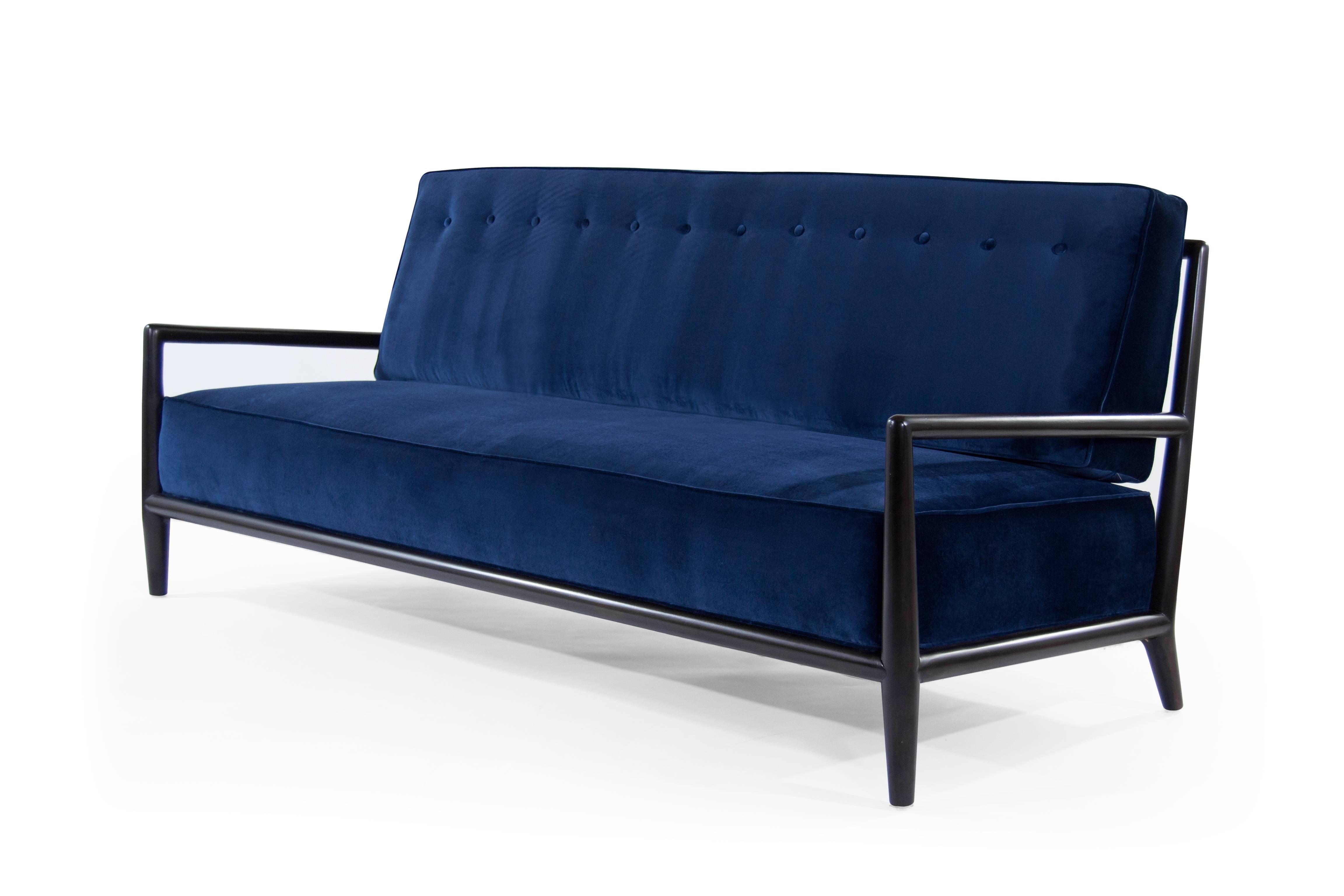 Stunning sofa by T.H. Robsjohn-Gibbings for Widdicomb, walnut frame newly refinished in espresso. Re-upholstered in navy blue velvet.