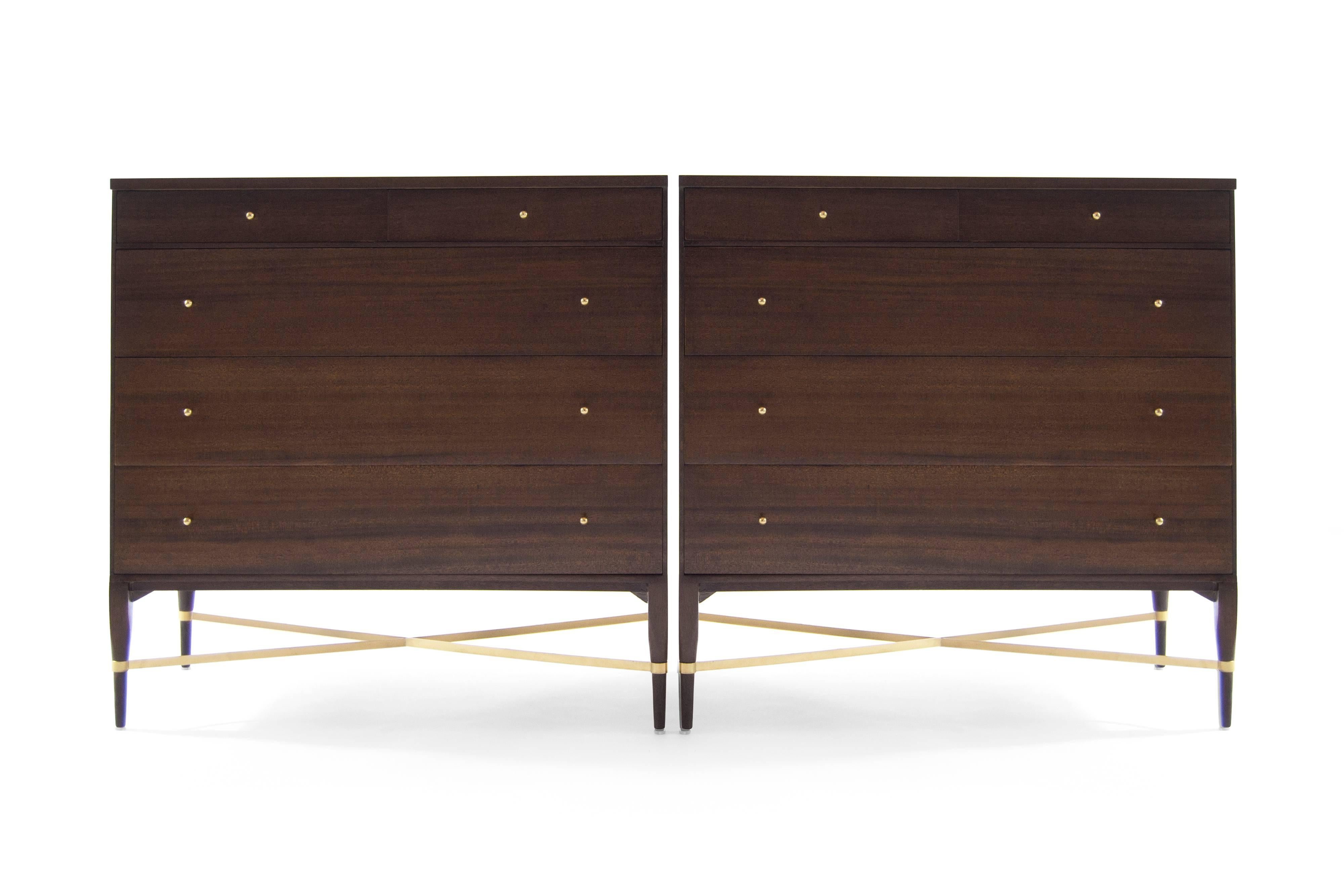 Pair of fully restored mahogany and brass bedside tables by iconic furniture designer Paul McCobb for Directional, circa 1950s. Priced as a pair, not available individually.

 