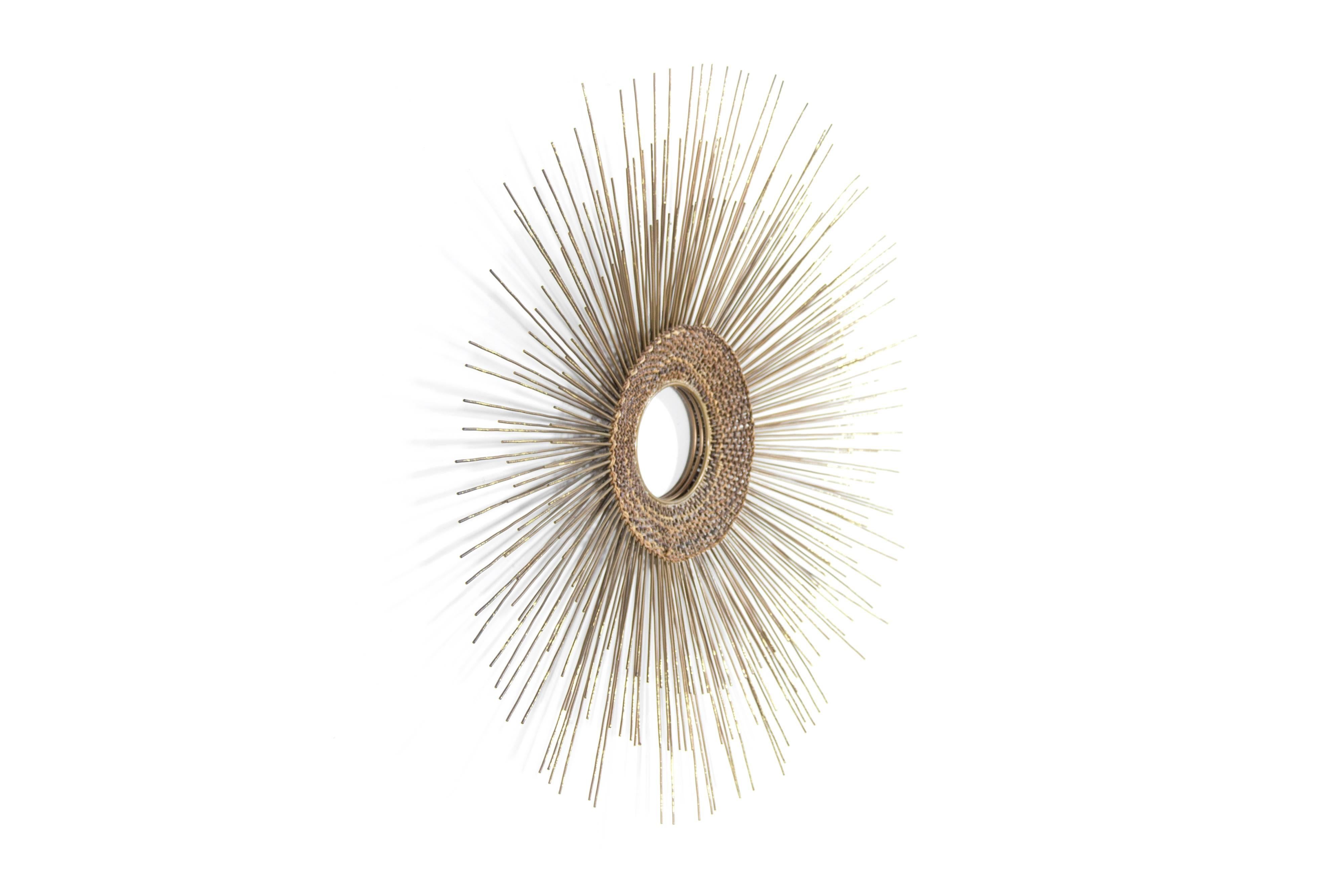 Rare 1950s copper and brass sunburst wall sculpture in the style of Curtis Jere.
 
