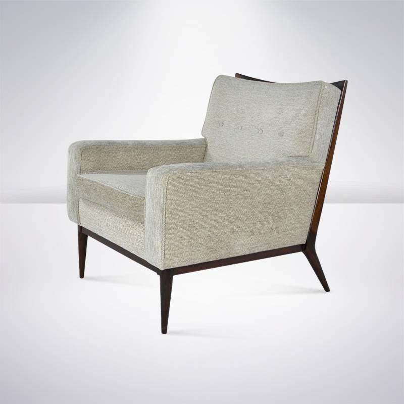 Classic Paul McCobb for Directional lounge chair with walnut frame newly refinished. Newly upholstered in grey chenille.

  
