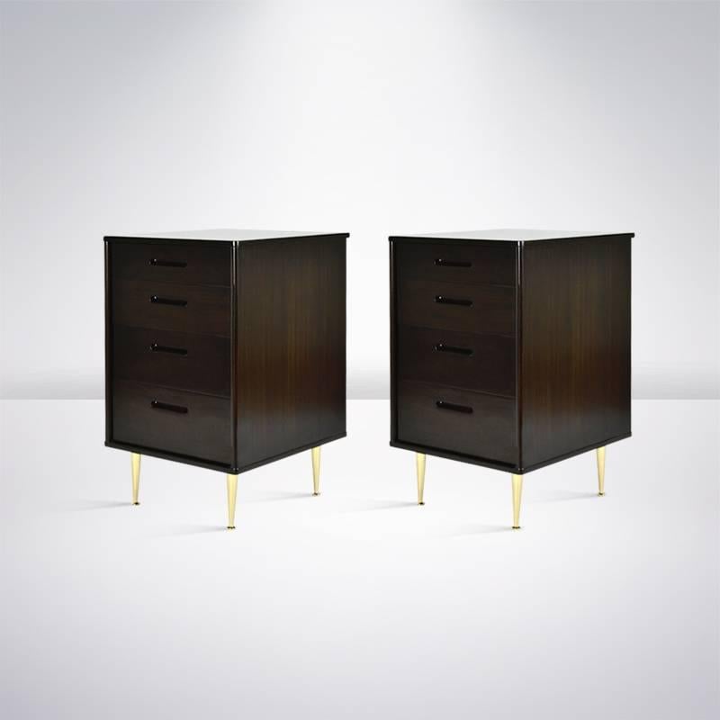Gorgeous pair of bedside tables or nightstands designed by Edward Wormley for Dunbar.

Newly refinished in dark chocolate. Solid brass tapered legs newly polished.