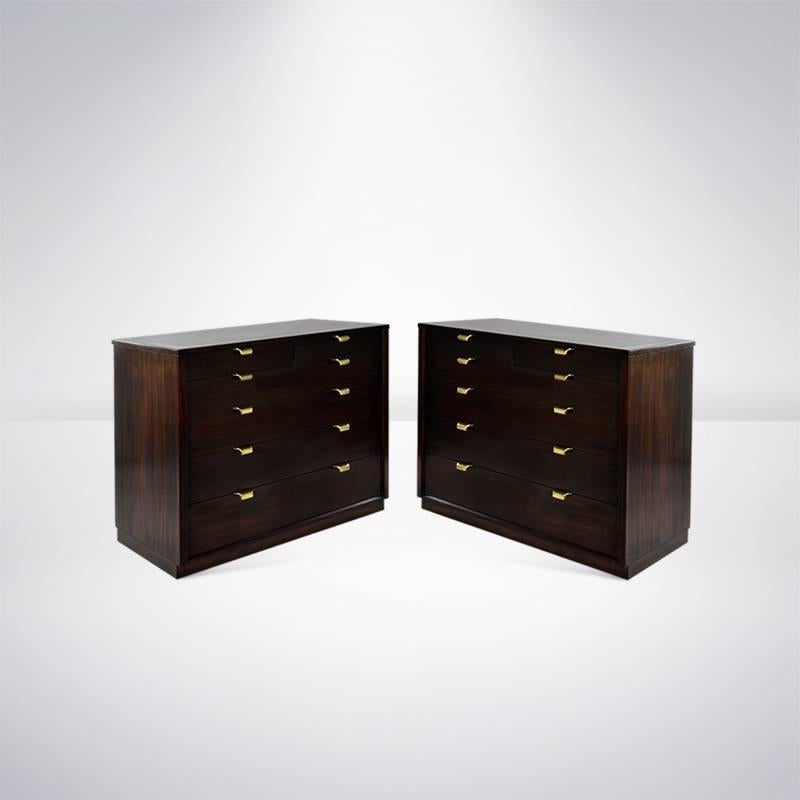 A very nice pair of chests of drawers designed by Edward Wormley for Drexel. Newly refinished in dark chocolate with newly brass-plated hardware.