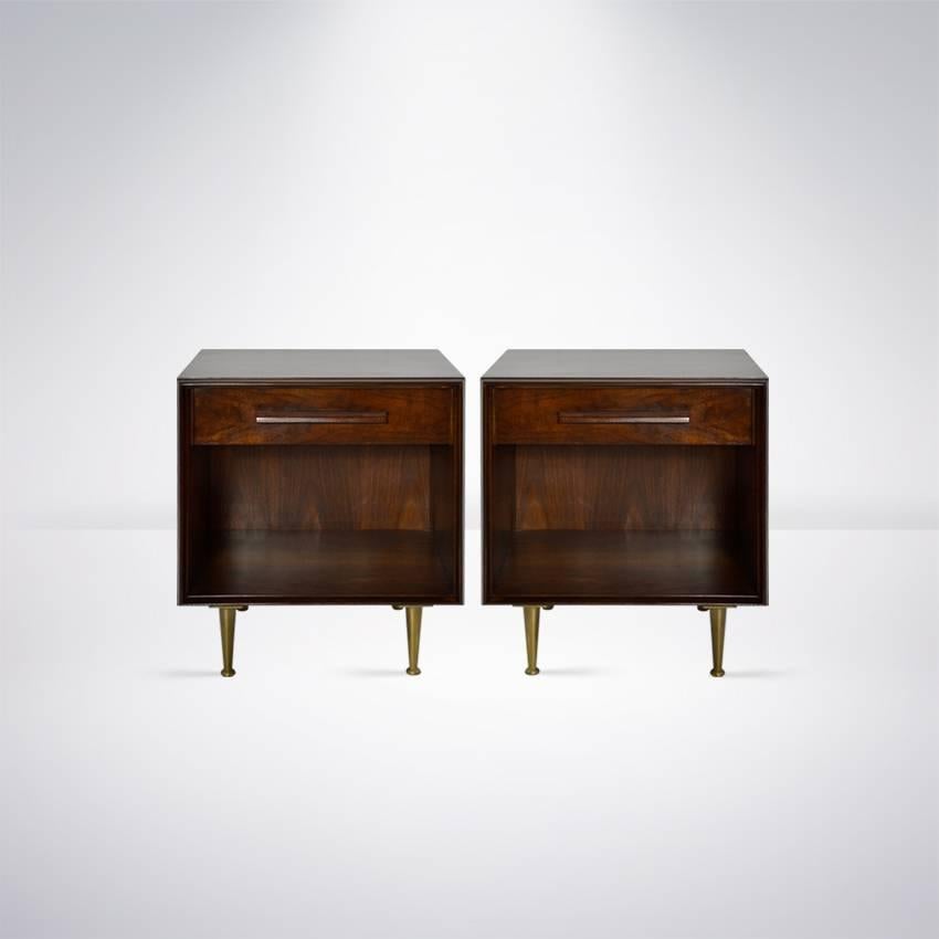 Exquisite pair of walnut nightstands or end tables by T.H. Robsjohn-Gibbings for Widdicomb, USA, circa 1950s.

Walnut has been restored to its original finish allowing for the wood grain to present beautifully.
 