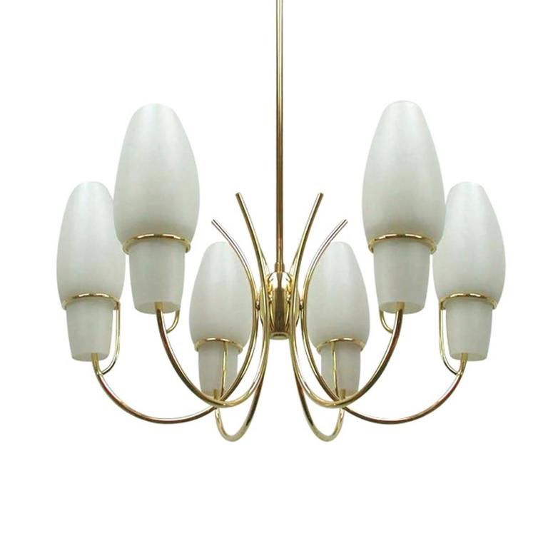 Mid-Century Modern brass chandelier features six opaline glass shades in perfect condition. Extraordinary in every way.