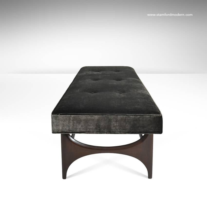 Sculptural walnut base newly refinished in dark. Top newly upholstered in dark green distressed velvet.