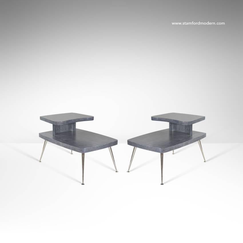 Stunning pair of Mid-Century Modern end or side tables. Newly refinished in grey cerused. Labeled underneath Fine Furniture, Gordon's Inc. Jonson City, Tenn, 1955.