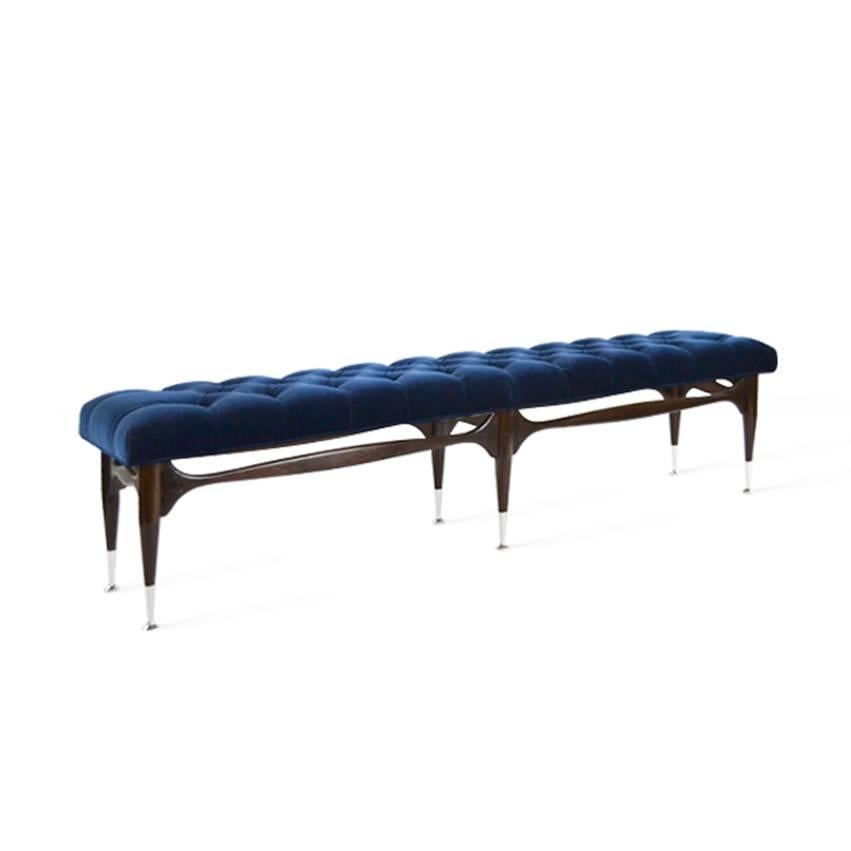 Mid-Century Modern sculpted bench, with nickel sabot details. Newly upholstered in tufted navy blue velvet.

 