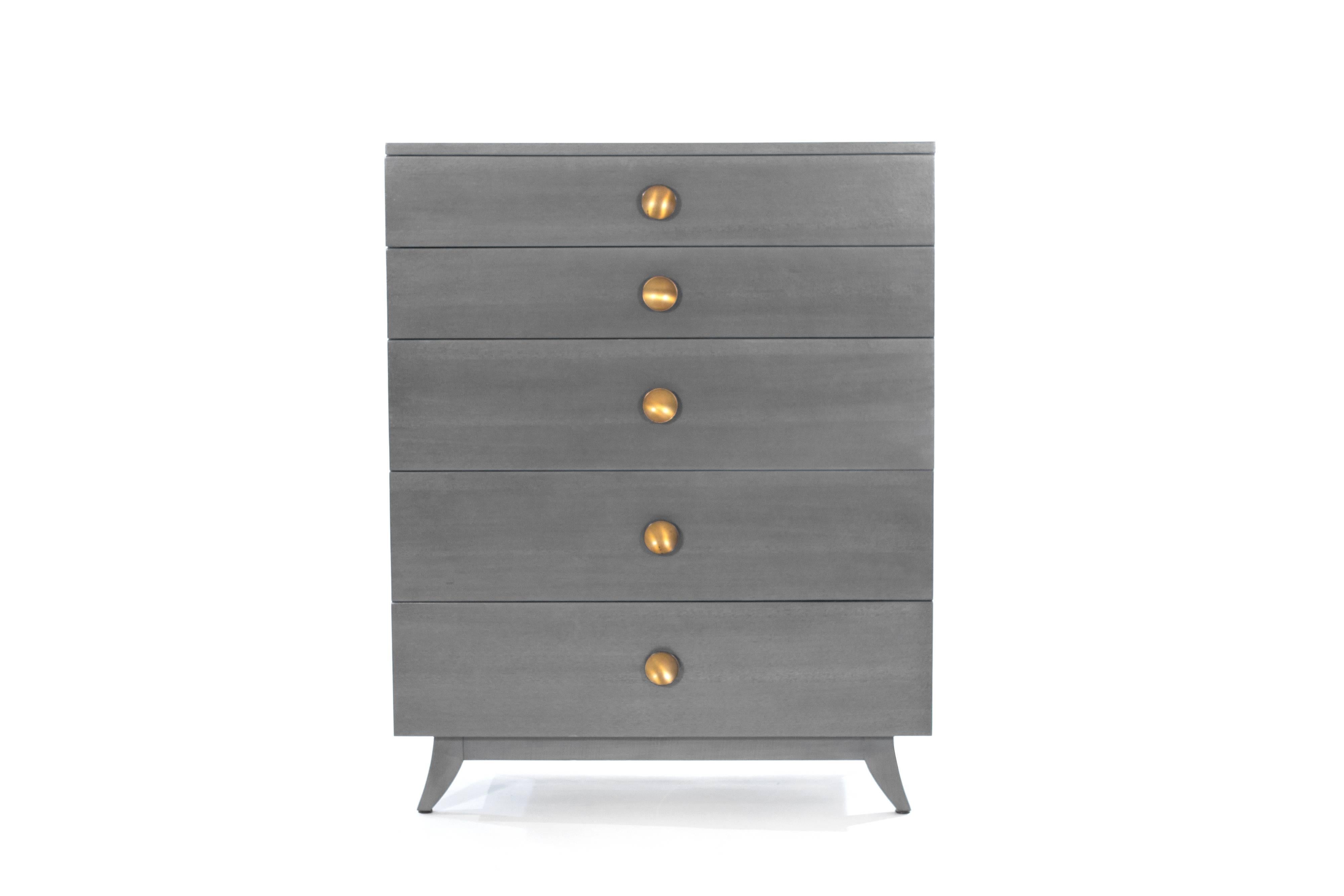 Tall dresser or highboy with sabre leg detail, designed by Gilbert Rohde, manufactured by Herman Millerm, circa 1950s. Newly refinished in grey, large brass pulls retain original patina.