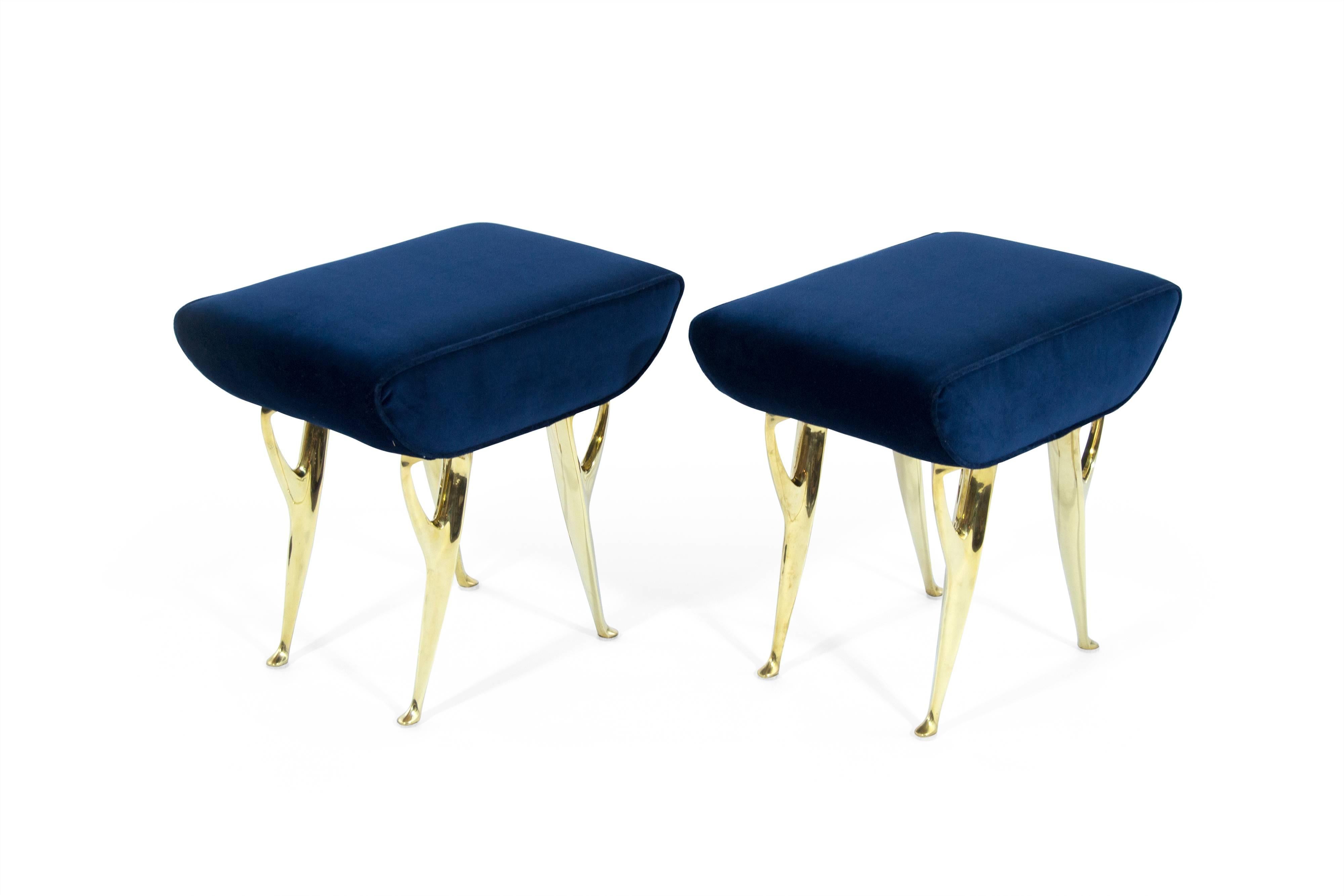 A pair of lovely modern stools, originally manufactured in Italy, circa 1950s. 

Legs newly polished, reupholstered in navy blue velvet.


 