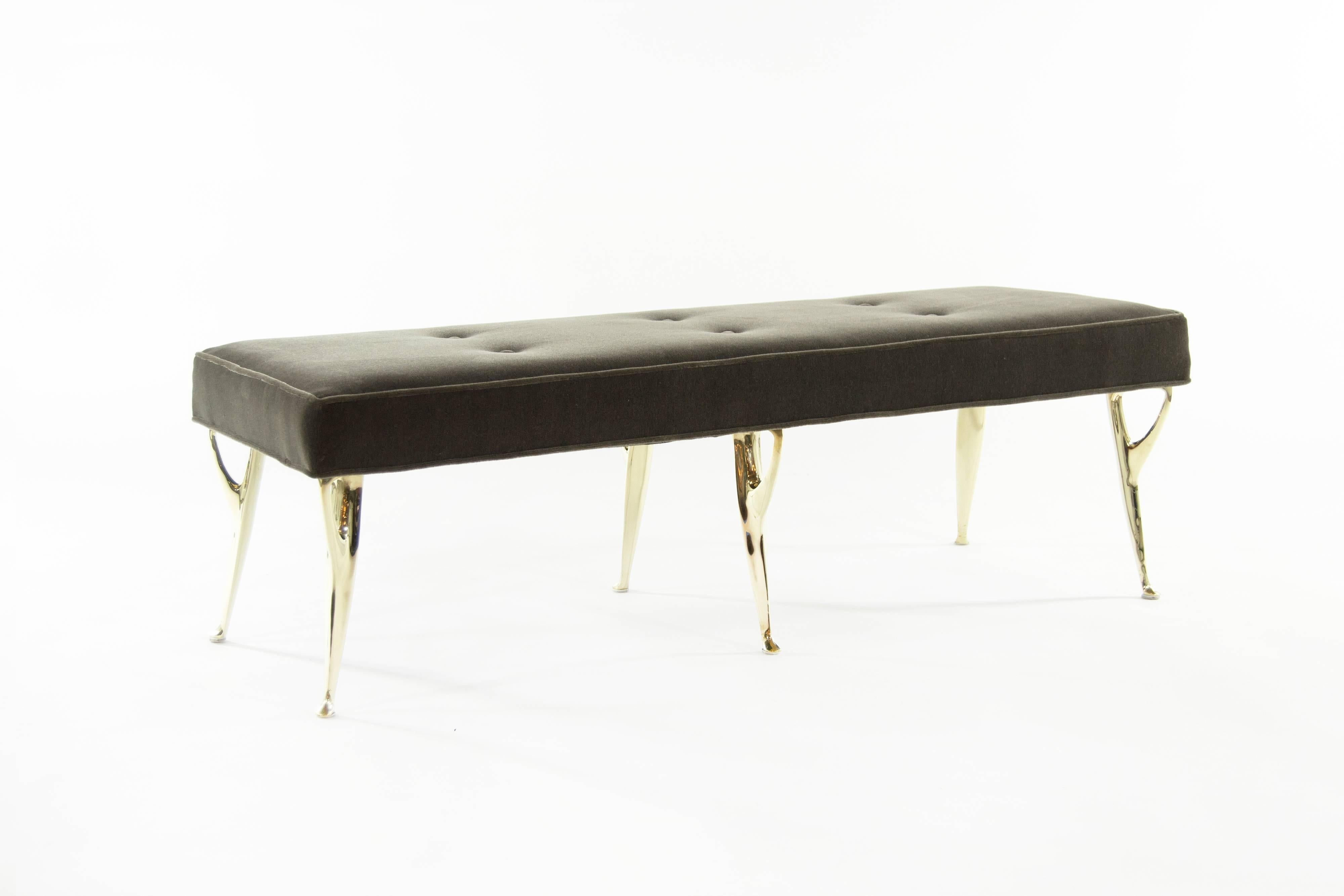 Italian bench featuring sculptural solid brass legs, newly upholstered in brown mohair.