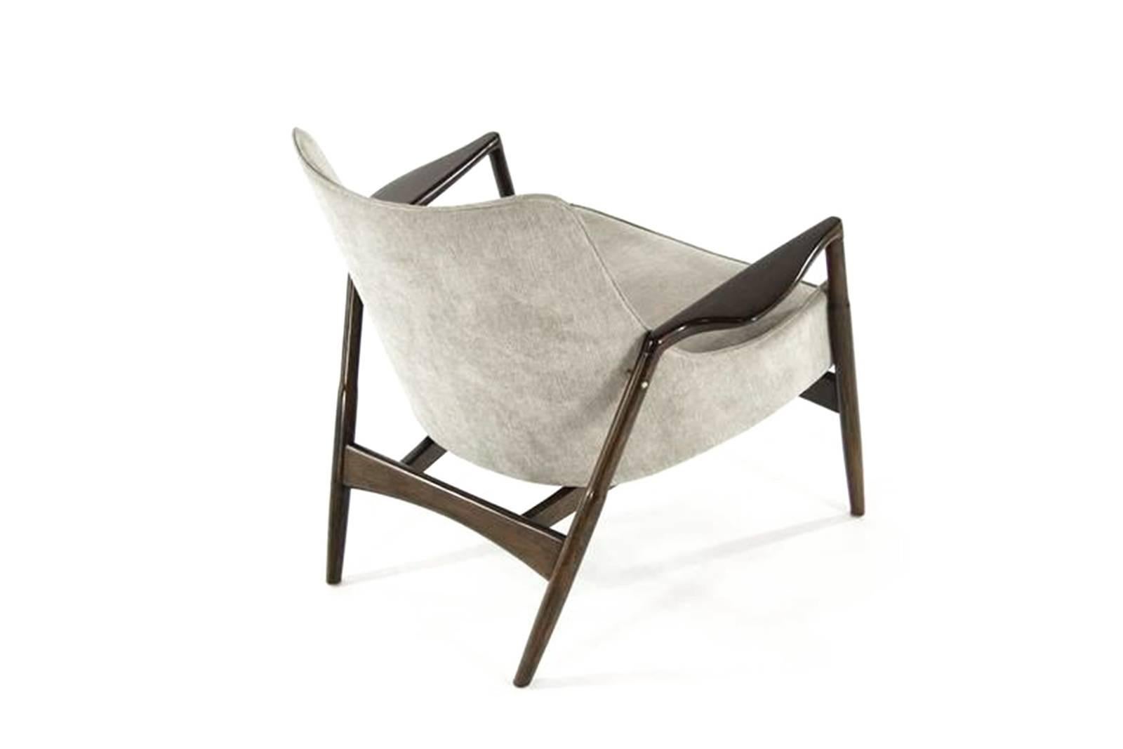 Danish Modern lounge chair by Ib Kofod-Larsen. Wood fully restored. Newly upholstered in brown cotton velvet.