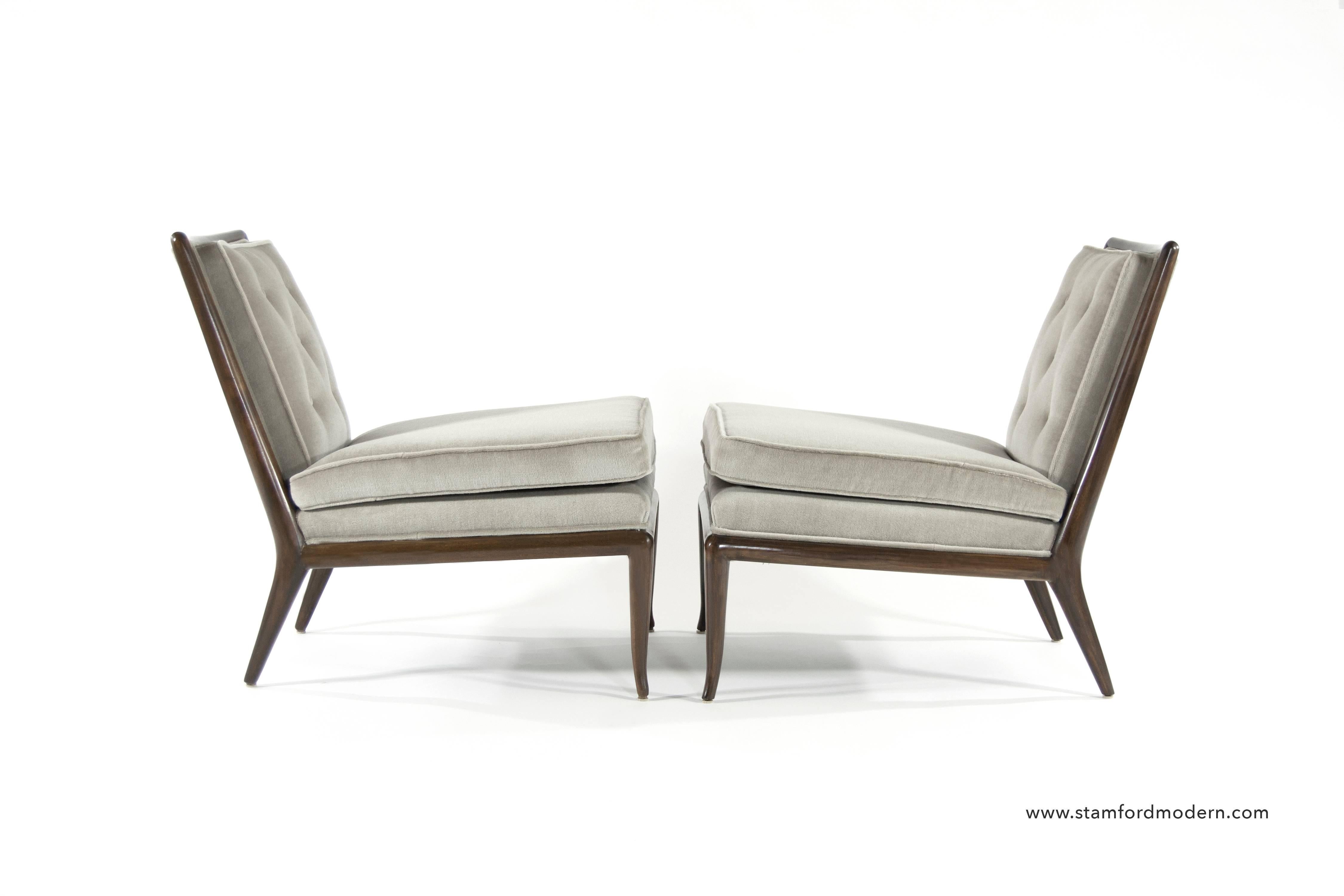 Pair of slipper chairs model WMB each in a walnut frame and newly upholstered in grey mohair. 

Designed by T.H. Robsjohn-Gibbings for Widdicomb, American, circa 1950.
                   