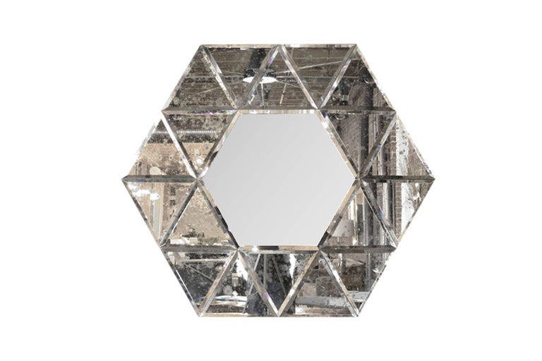 Large-scale hexagonal antiqued mirror, circa 1940s. Mint condition.