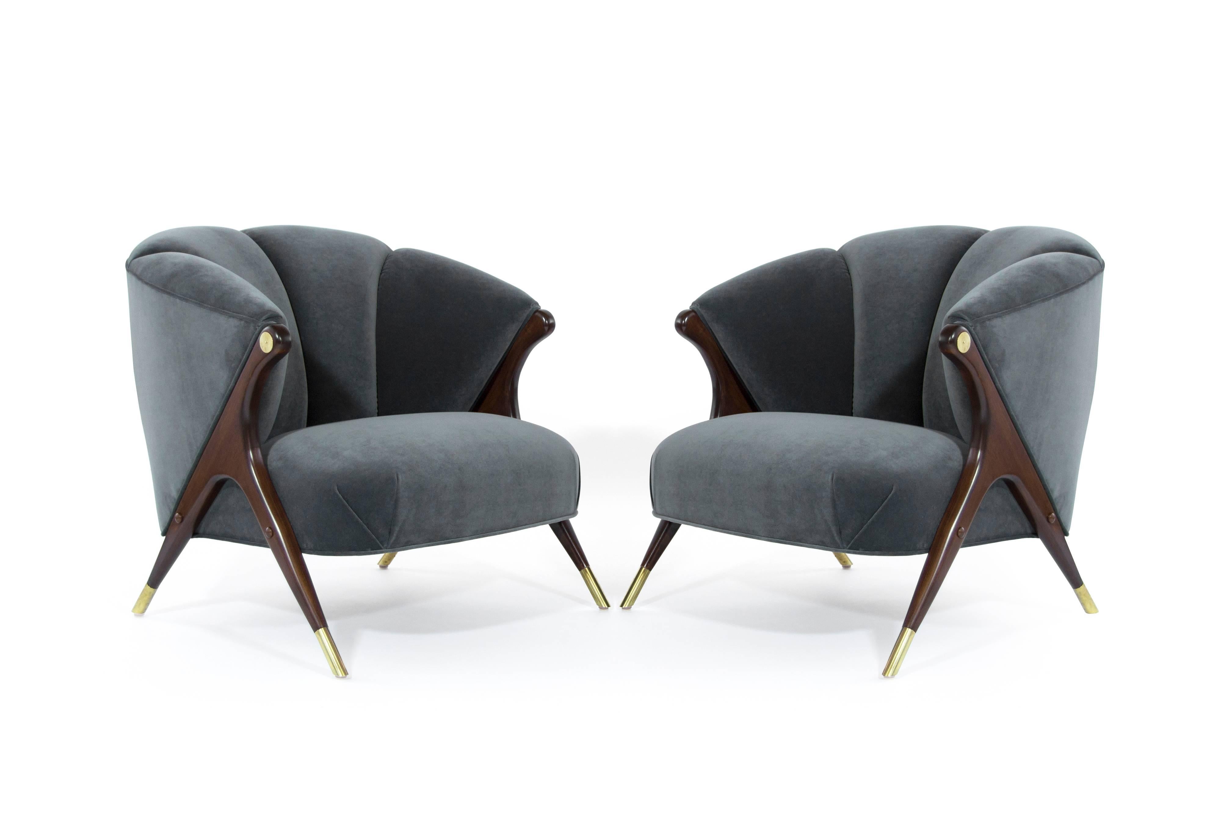 Stunning and rare pair of lounge chair by Karpen of California, circa 1950s.

Newly upholstered in granite velvet, sculptural walnut legs newly restored to their original medium walnut finish, brass newly polished.
 