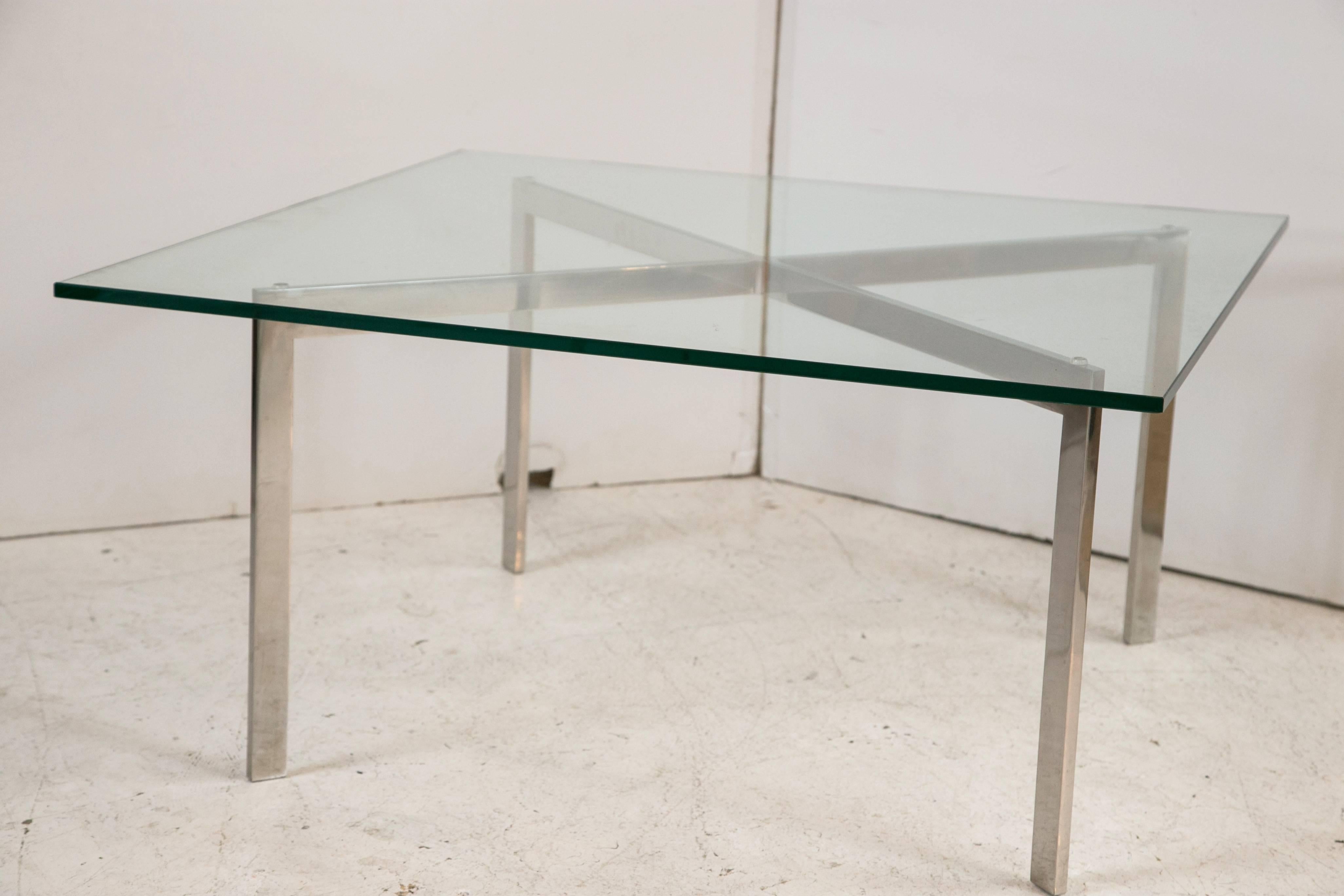 The iconic Barcelona table by Knoll, the perfect complement to the Barcelona chair designed by Ludwig Mies van der Rohe. This is an earlier edition of the piece designed with the original 16.75H. To ensure authenticity the piece is stamped KP on the