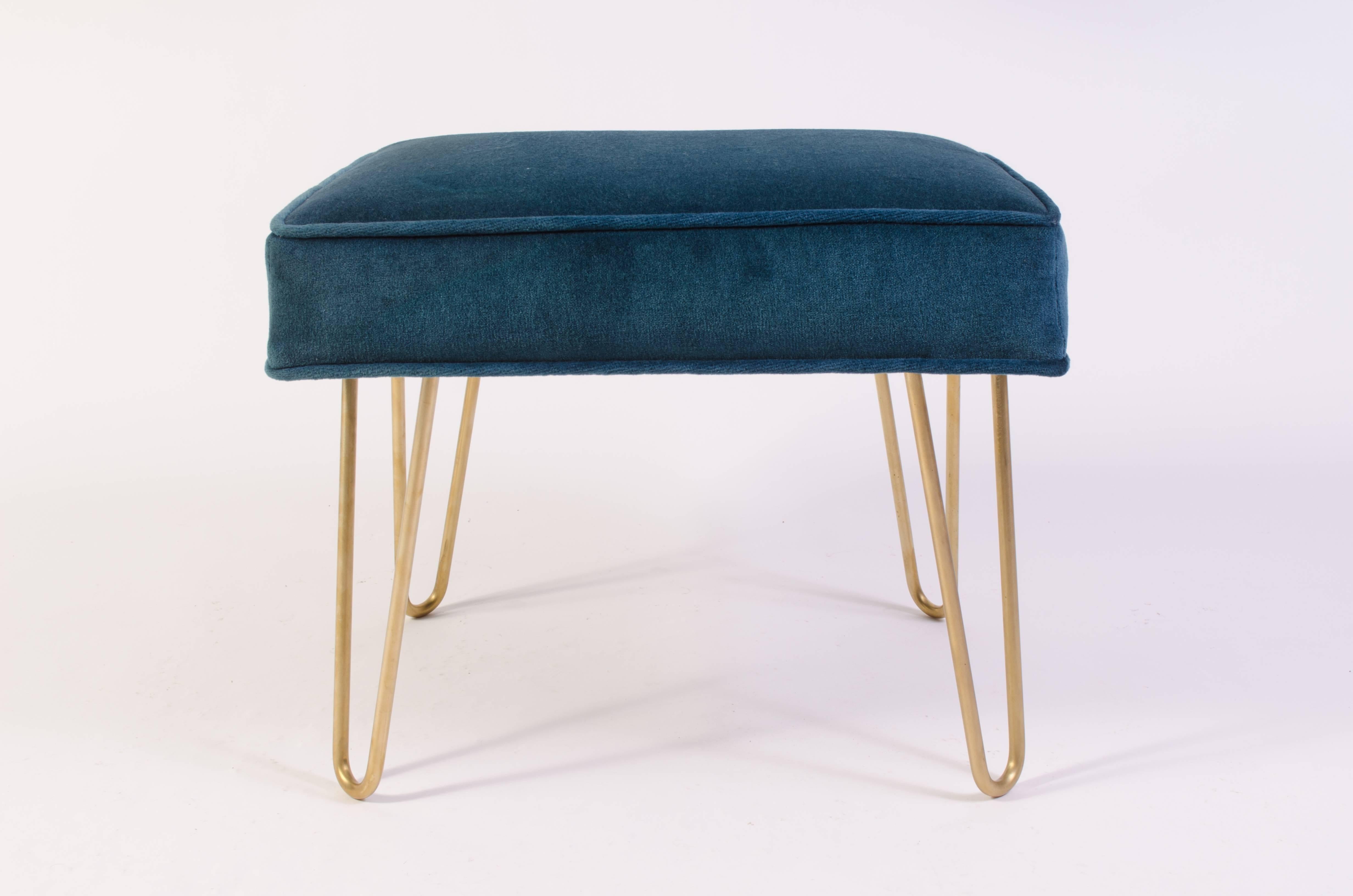 The perfect addition to any space! Wonderfully proportioned pair of ottomans upholstered in a supple Teal Velvet of the highest quality; 100% cotton. These work in a multitude of spaces: in a living space, under a console, at the foot of a bed.