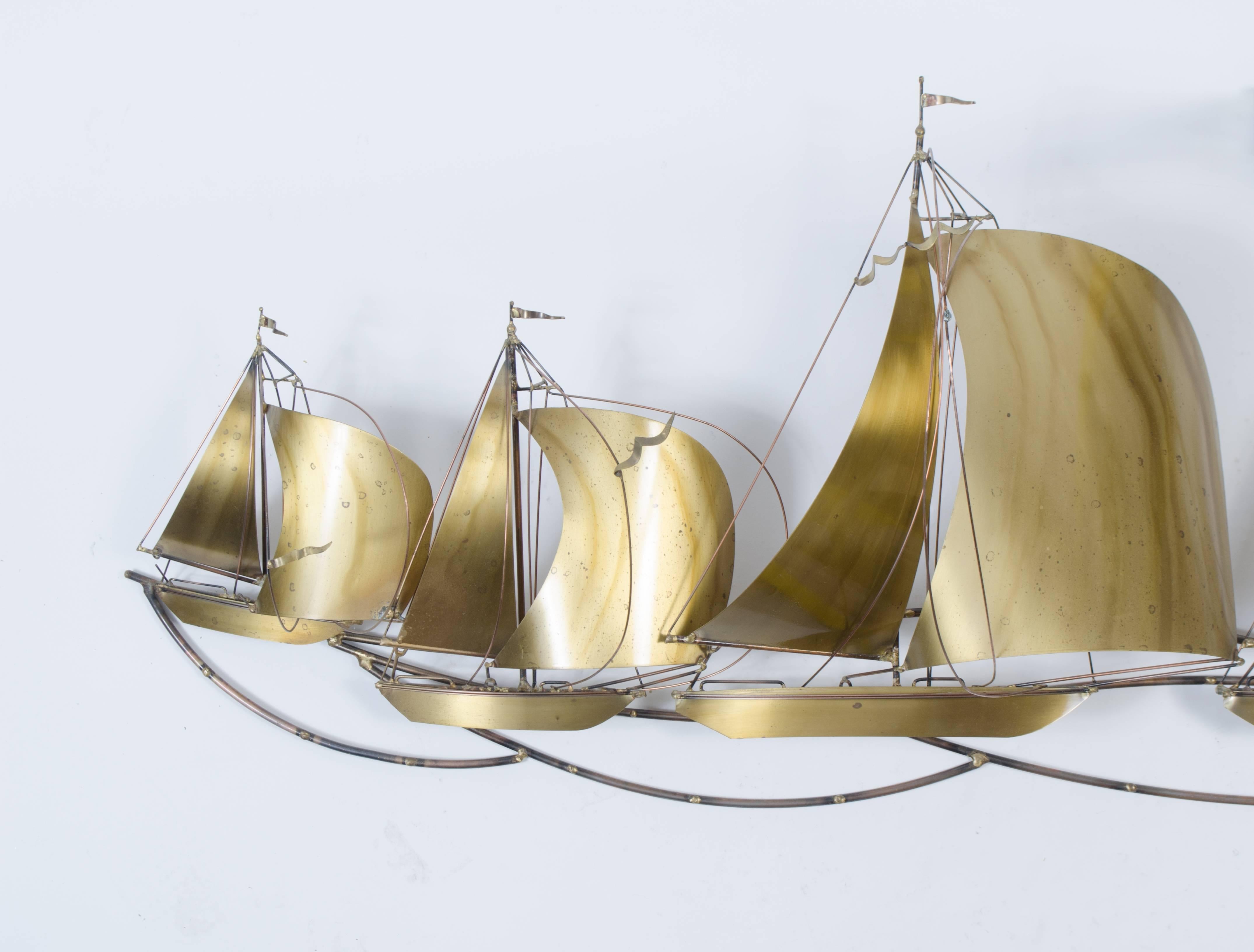 Capturing the moment of a bustling sail ship regatta, expertly done by C. Jere as expected. Five ships crafted from brass frozen in space, some near and some far. A wonderful wall mount with splendid visual movement.