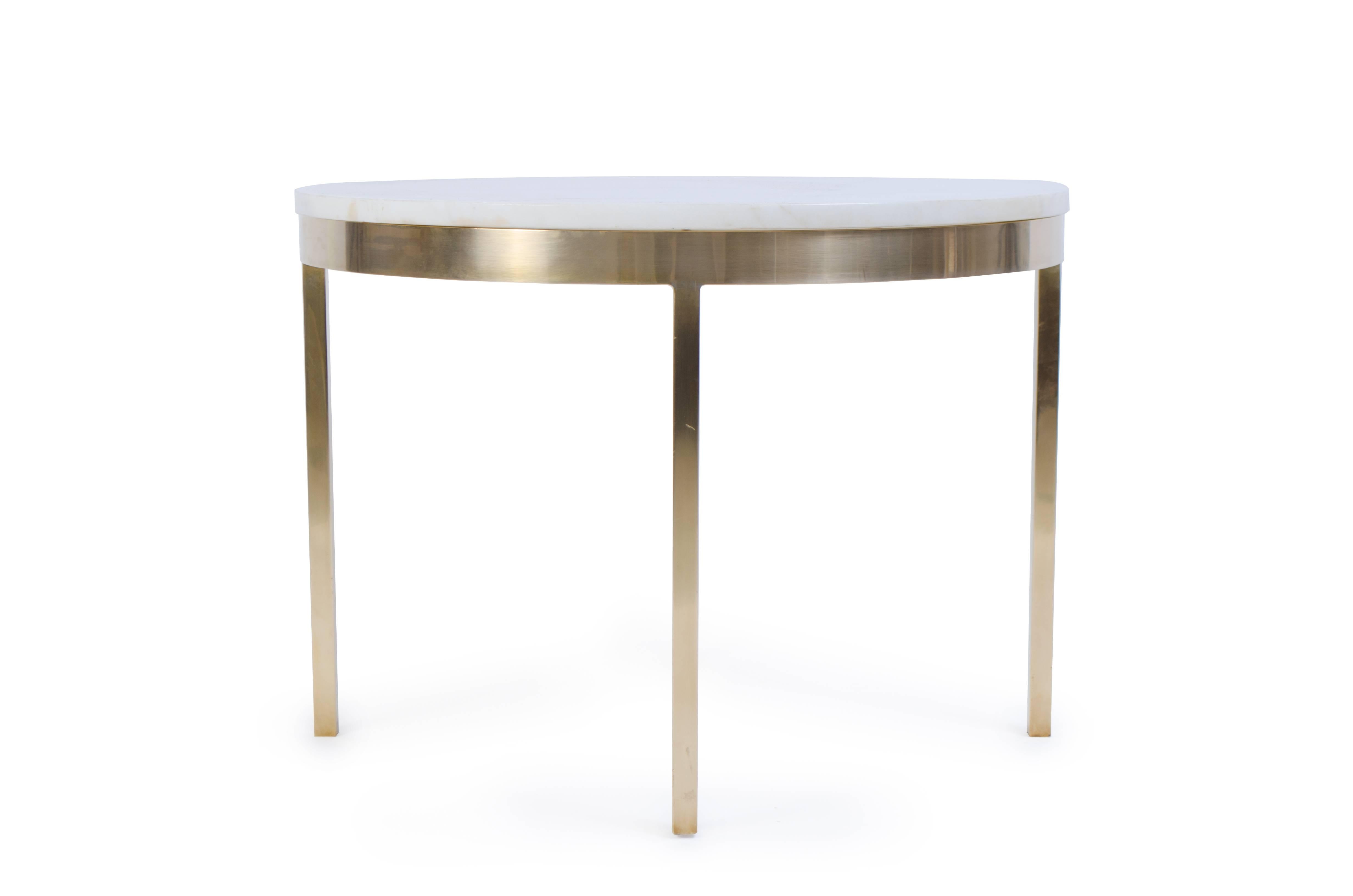 Marble, brass and oh so stunning! This petite round accent table makes for the perfect addition to any room, between two chairs or next to a lounge chair. Crafted from Carrara marble and solid brass, wonderful materiality.