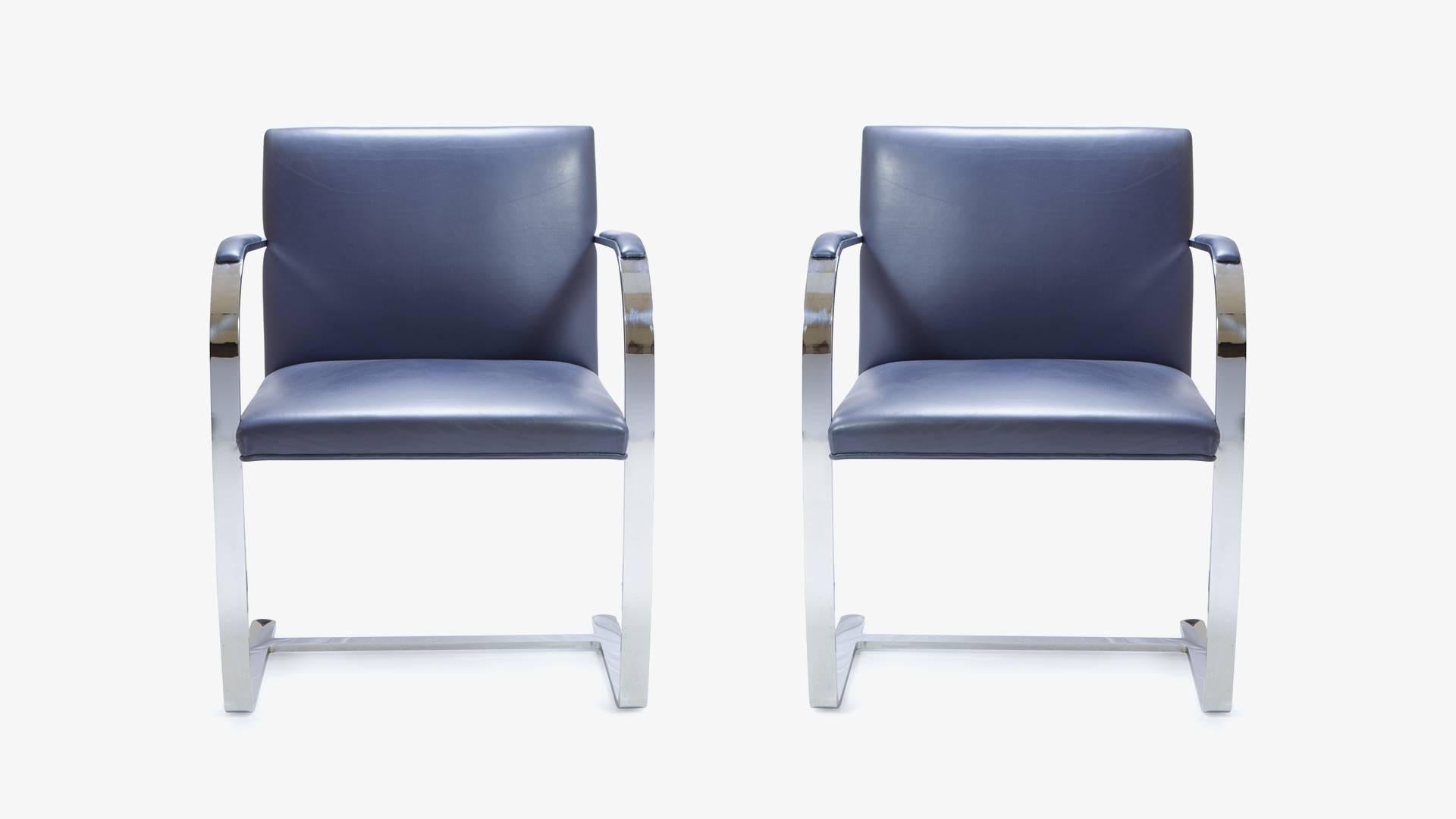 The definition of minimalism in a singular design, achieved by the great Ludwig Mies van der Rohe in 1929; the brno flat-bar chair is just that. These are contemporary edition Mies van der Rohe for Knoll chairs upholstered in a supple Navy Blue