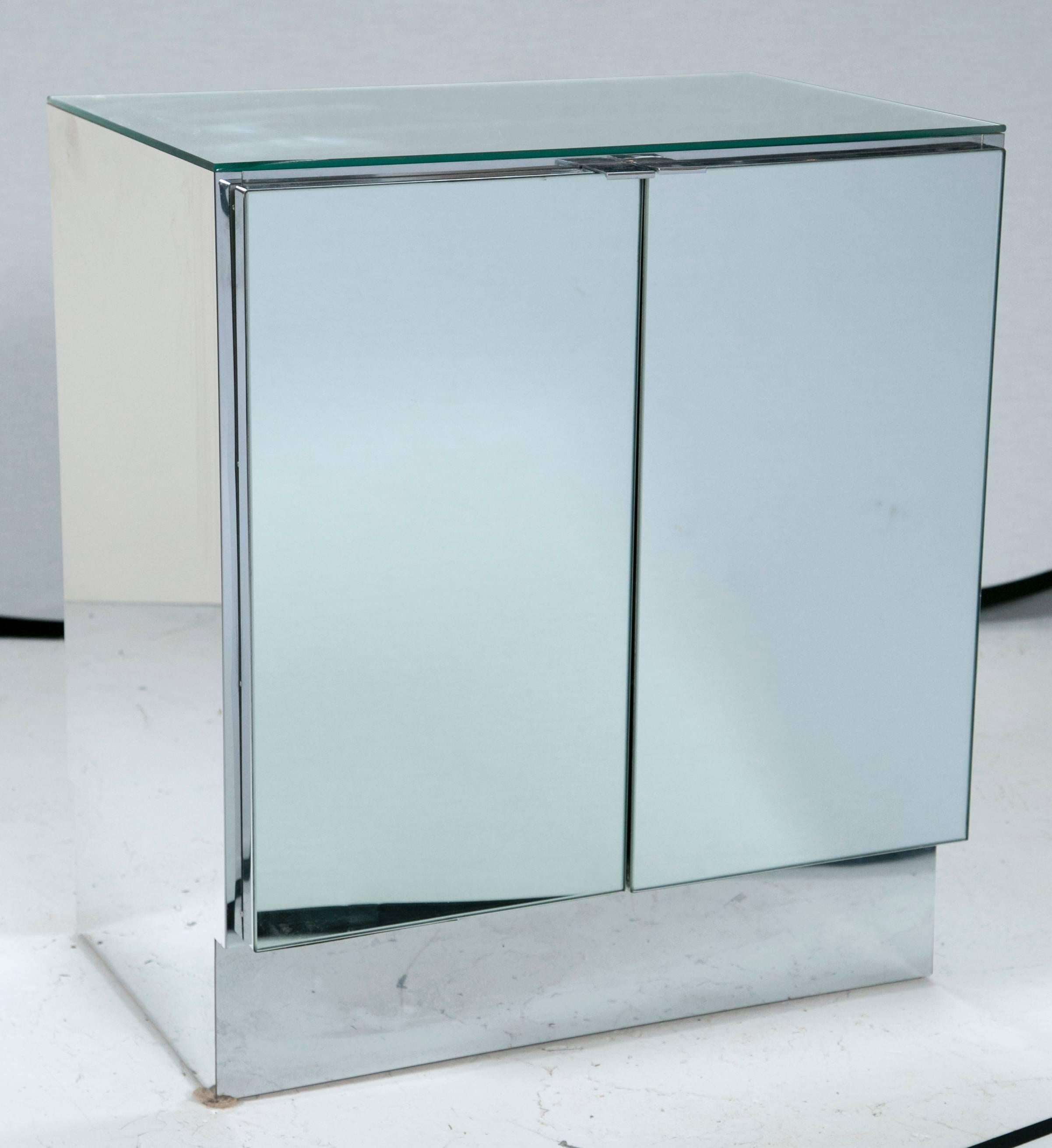 The ultimate statement pieces. Stunning minimally designed mirrored night stands by Ello Furniture. Includes a surface top built in lighting unit. Perfect for maintaining a simple look while incorporating accent light.