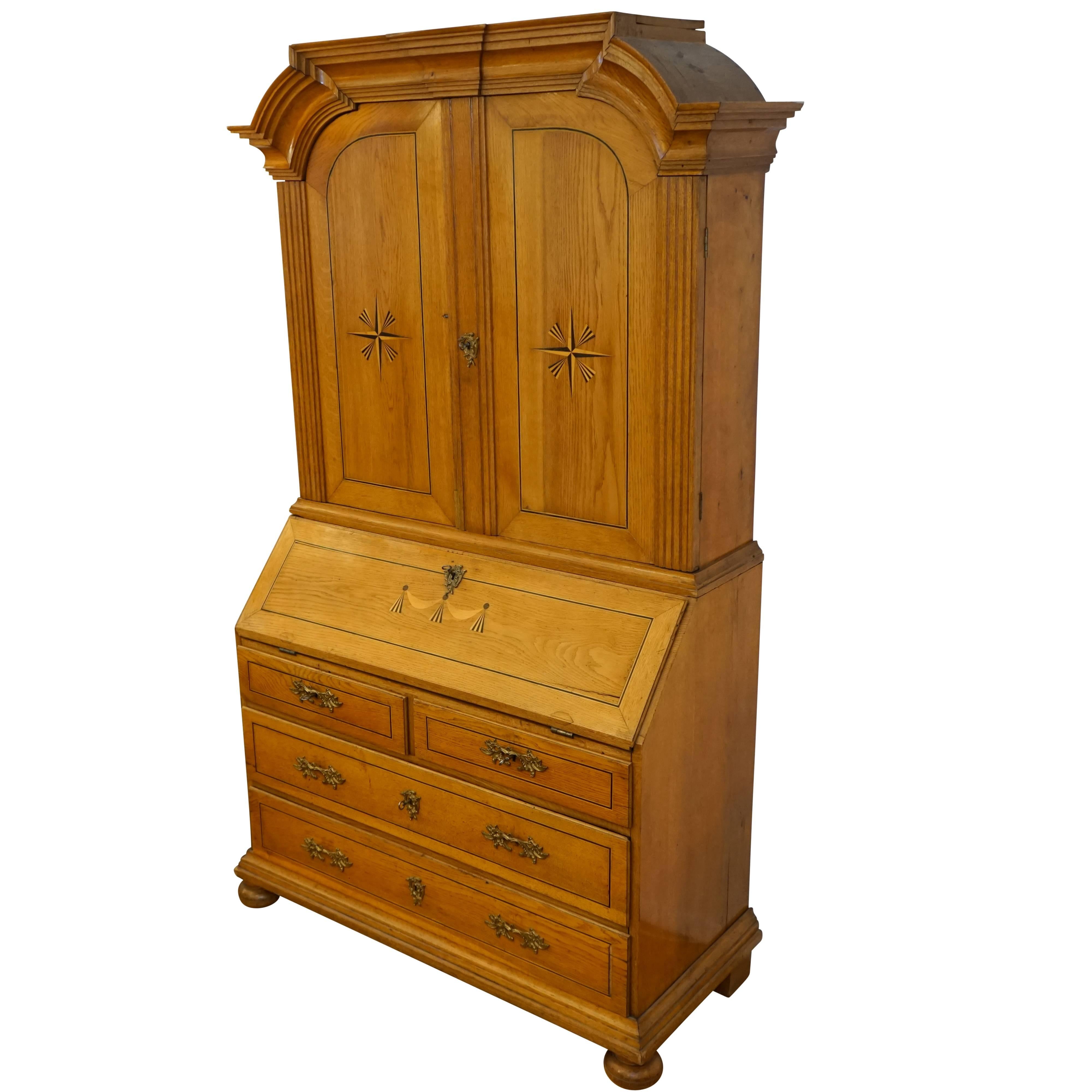 A long and lean piece which has graciously stood the test of time, at least 250 years! Hand-hewn of golden European oak and Nordic fir and inlaid with mahogany and birch, the Classic secretary offers locking storage above for books, multiple