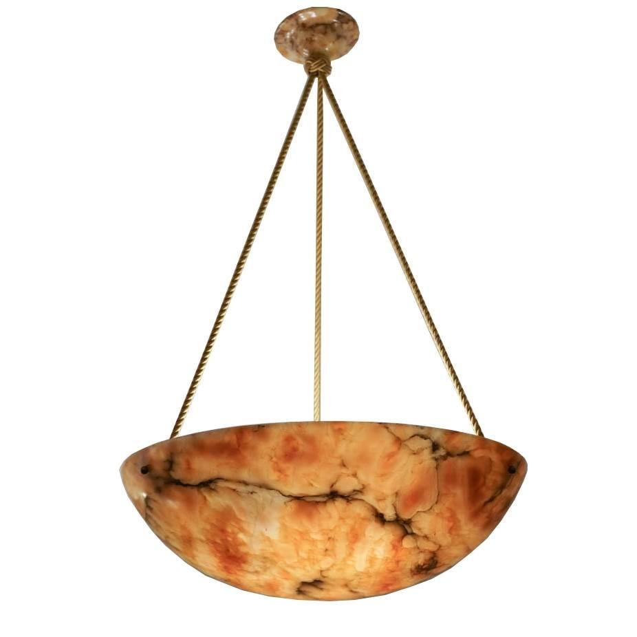 A mesmerizing combination of bright and burning alabaster stone, turned into a fabulous light! The sleek and simple design allows the alabaster to shine and beautiful. Recently rewired, the piece holds a trio of dimmable LED bulbs of any wattage