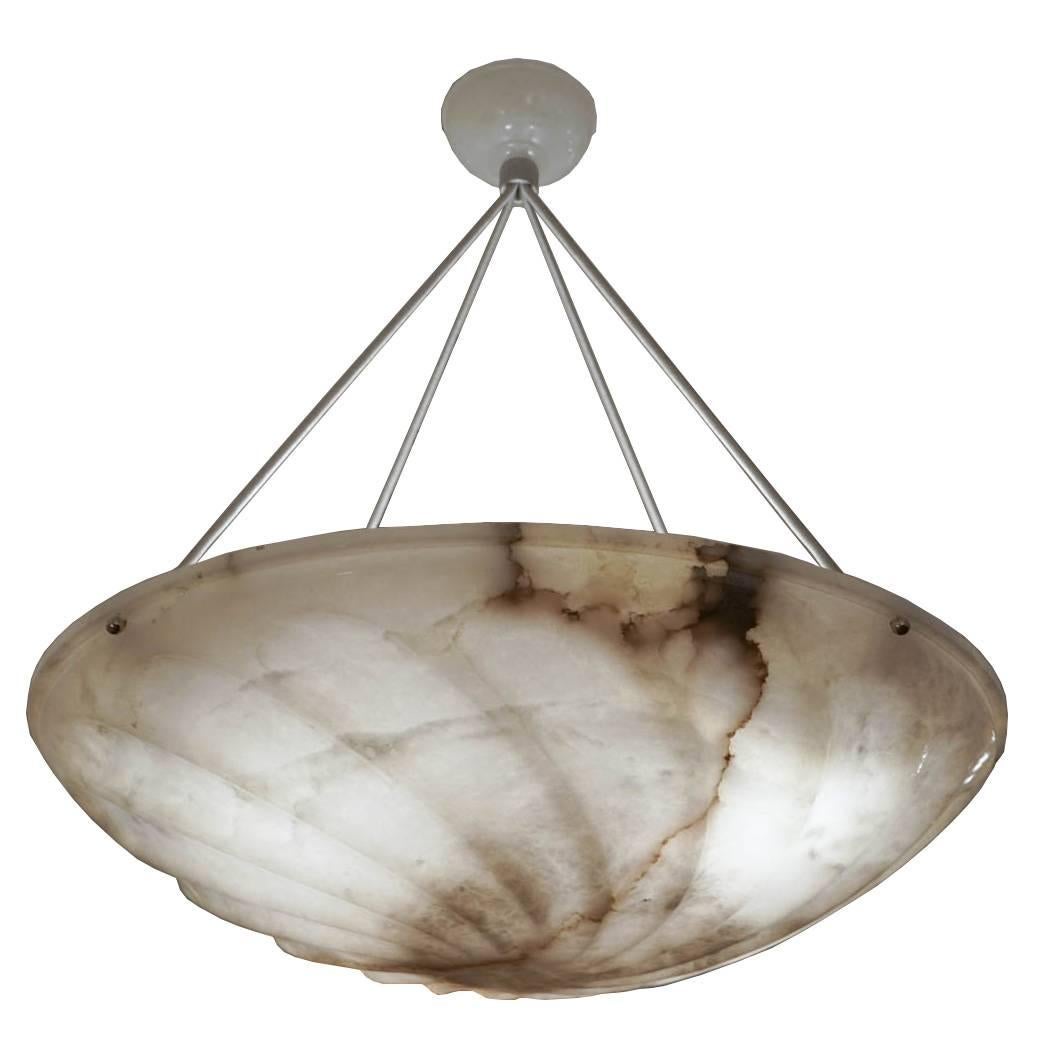 Large and deep with distinctive mineral veining, this fixture was designed for the same bank as AL8 but is of a decidedly different temperament. This light fixture graced the main gallery of a Swedish bank built in the early 1900s when electricity
