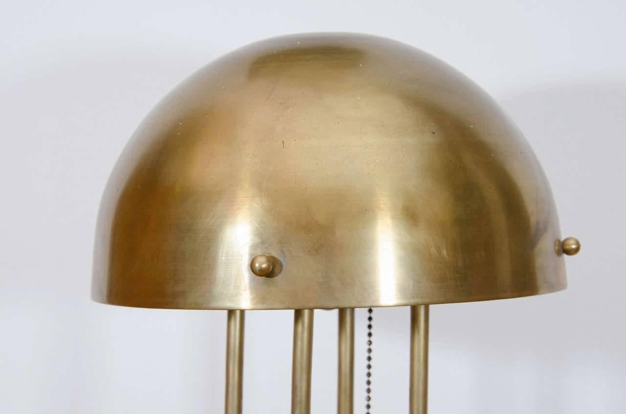 Formed of solid brass and modeled after the lighting designed by Josef Hoffmann for the Haus Henneberg, a private residence on the Hohen Warte in Vienna, Austria between 1900 and 1904, this pair was made for the local Austrian market in the 1960s.
