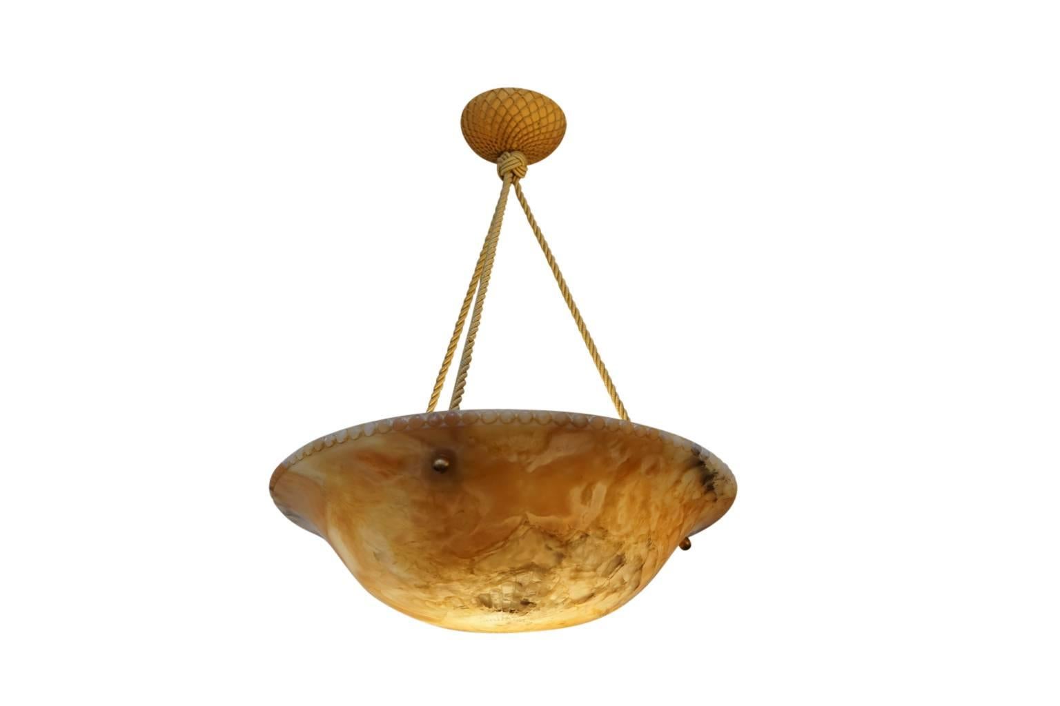 The colors of sunrise dominate this delicately carved 1920s alabaster pendant from Sweden. A bespoke fixture, created for a 19th century home which predated electricity, reflected the neoclassical elements of the residence which was retrofitted for
