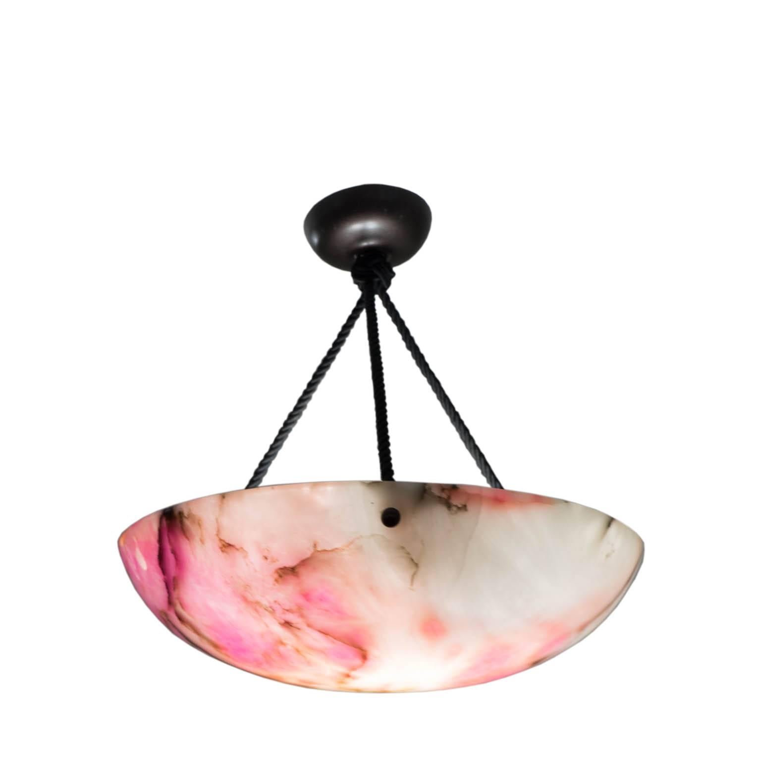 A traditional, period treatment of submersion in beet juice resulted in this stunning transformation of a beautifully veined fixture of white alabaster to Hot Pink! Rare examples of this 1920s technique are occasionally found, as are baby blue and