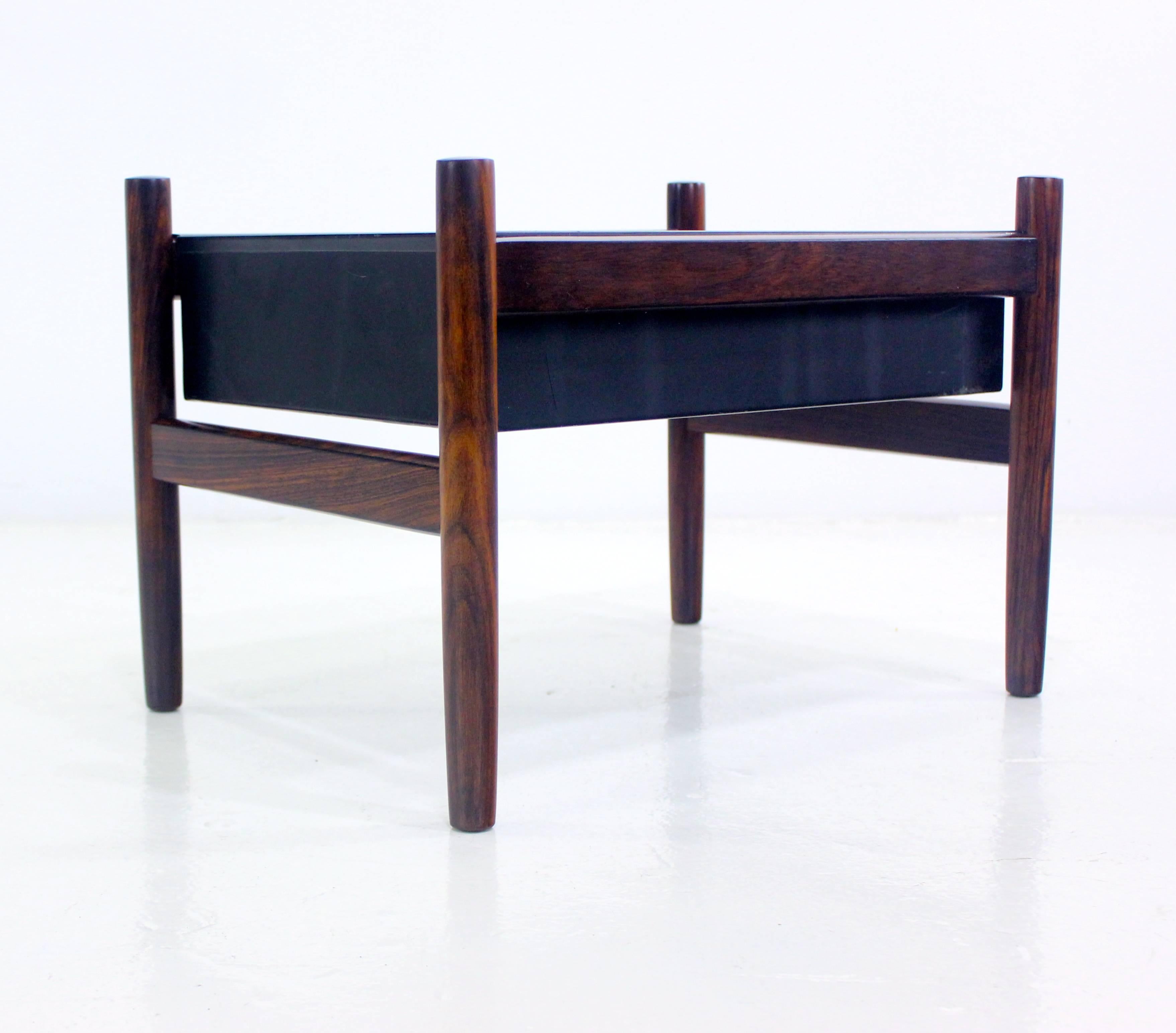 Two Danish modern planters.
Classic Minimalist rosewood frames with black metal insert.
Professionally restored and refinished by LookModern.
Matchless quality and price.
Low freight, quick ship.

 