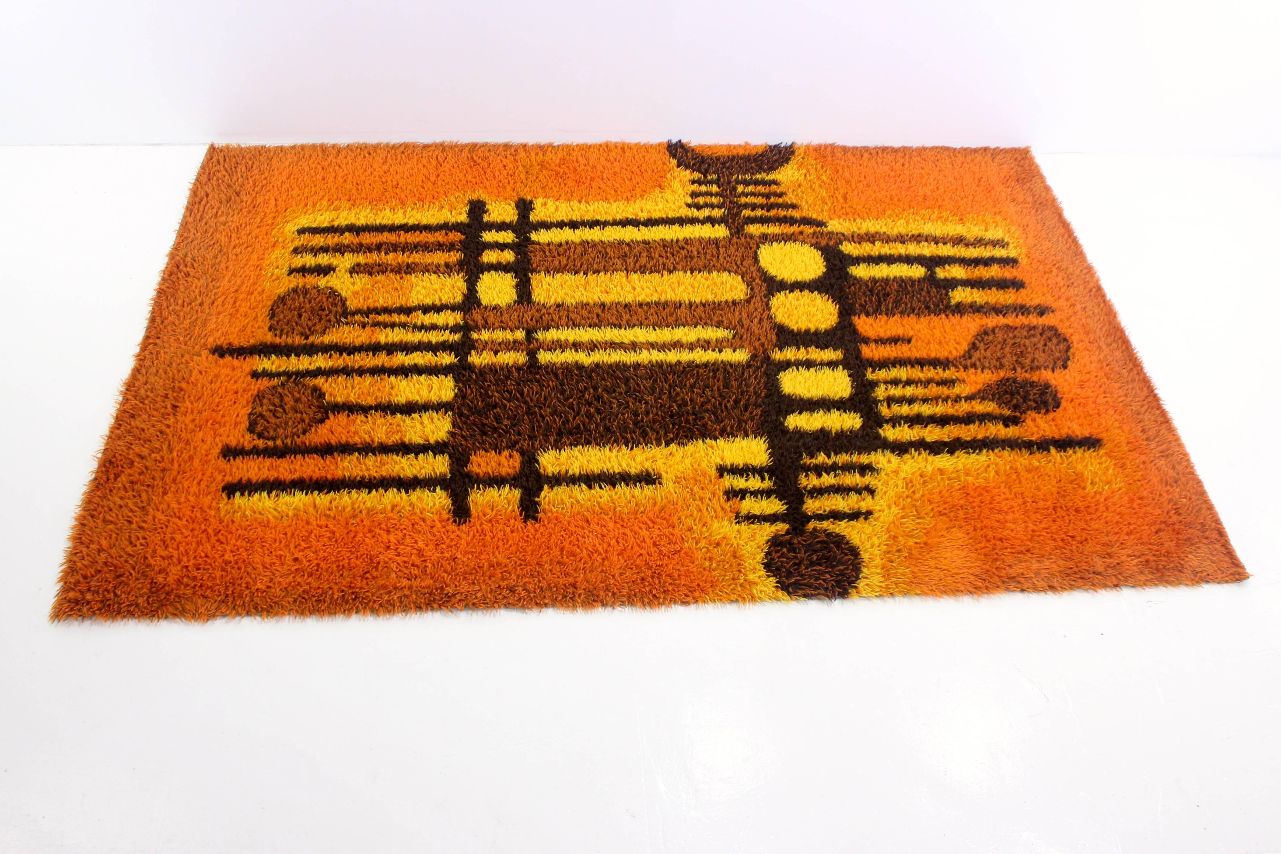 Danish modern Rya rug.
100% wool.
Rich browns create geometric pattern silhouetted against a radiant, glowing, graded yellow and orange field.
Matchless quality and price.
Low freight and quick ship.