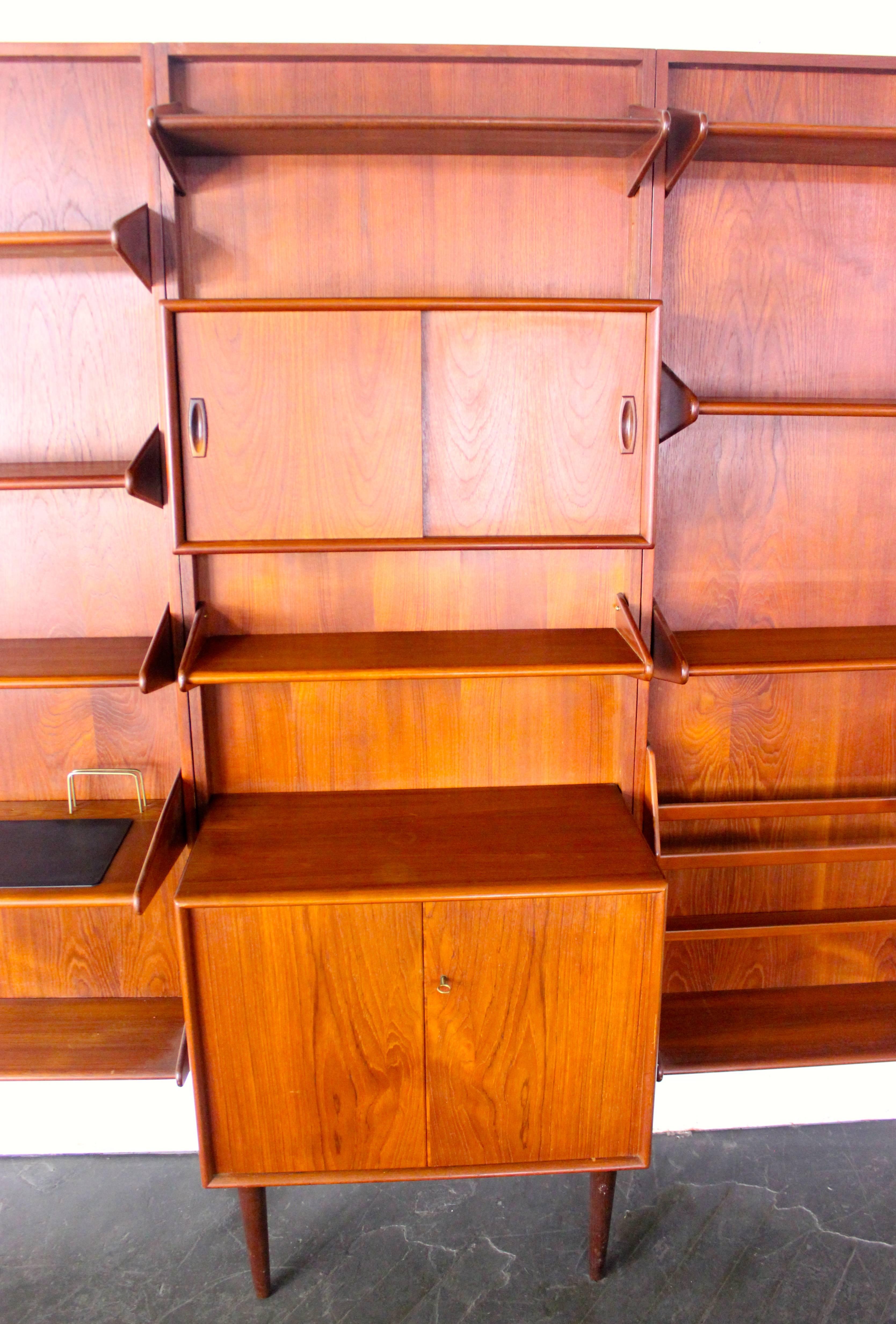 Expansive Danish Modern Teak Wall-Mounted Unit Designed by Arne Hovmand Olsen In Excellent Condition For Sale In Portland, OR