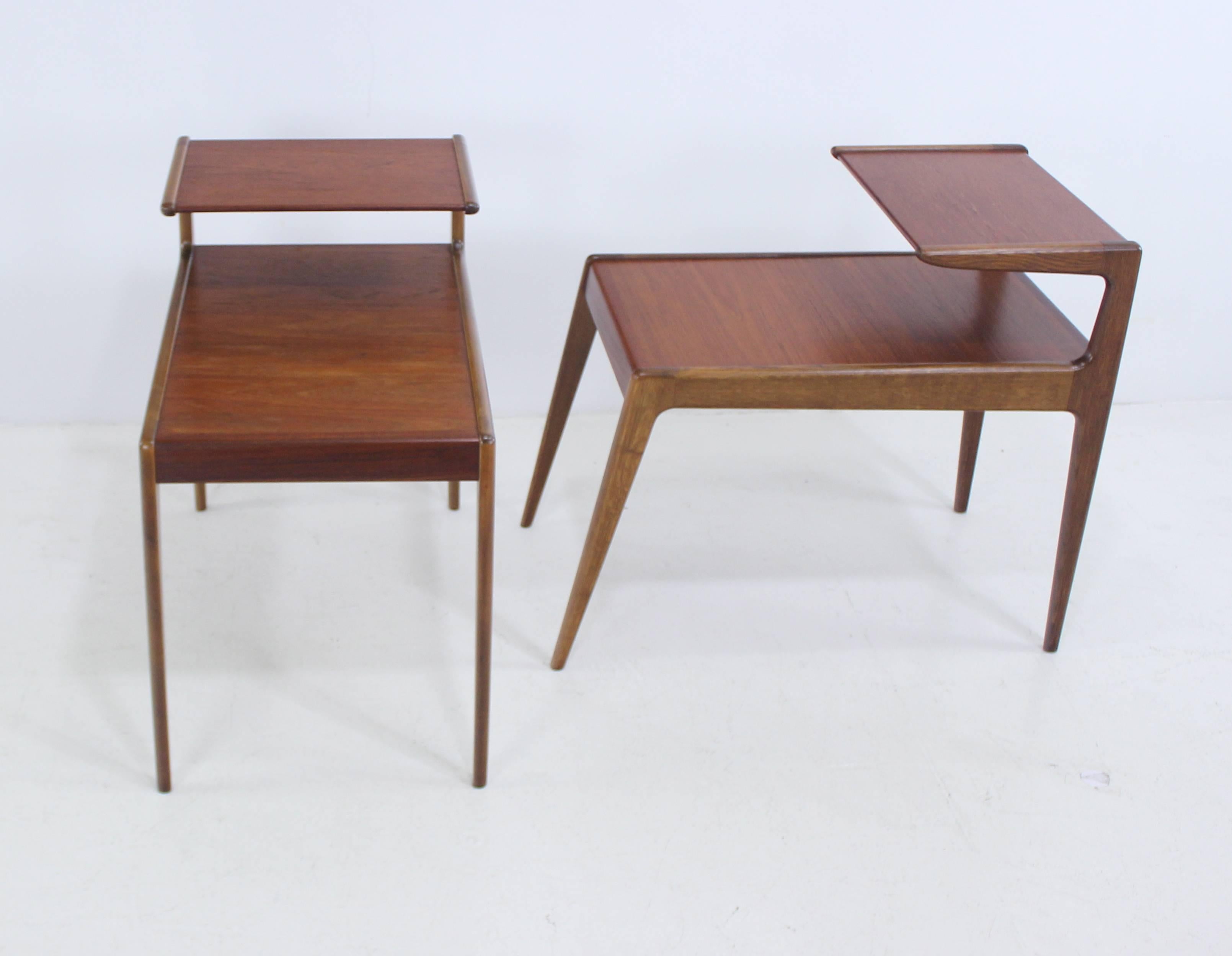 Two Danish modern end tables.
Designed with distinctive flair by Kurt Ostervig. Jason, maker.
A beautiful combination of beech frames and teak tops.
Lower surface height 18".
Professionally restored and refinished by LookModern.
Matchless