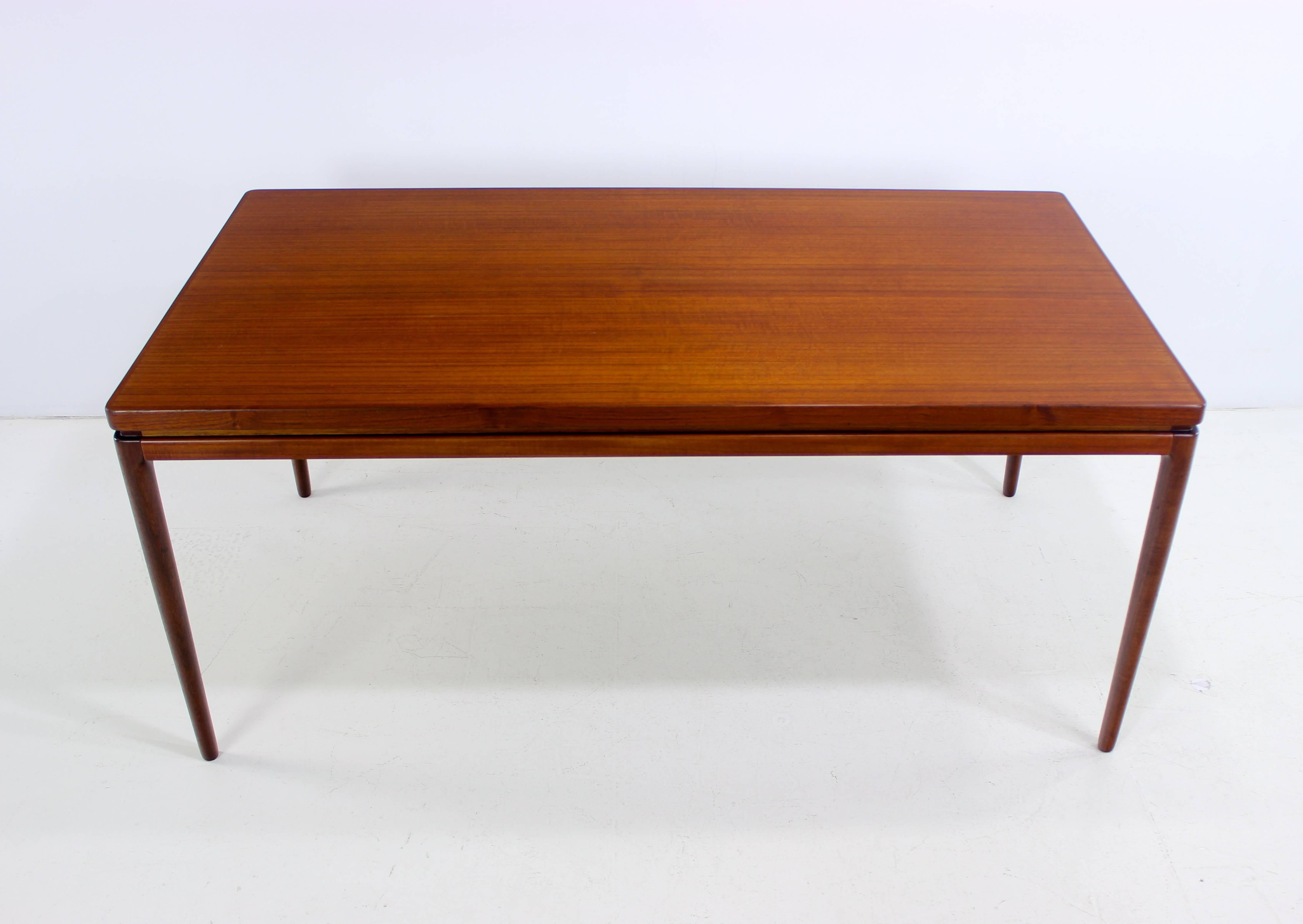 Danish Modern Teak Draw-Leaf Dining Table Designed by Johannes Andersen In Excellent Condition For Sale In Portland, OR