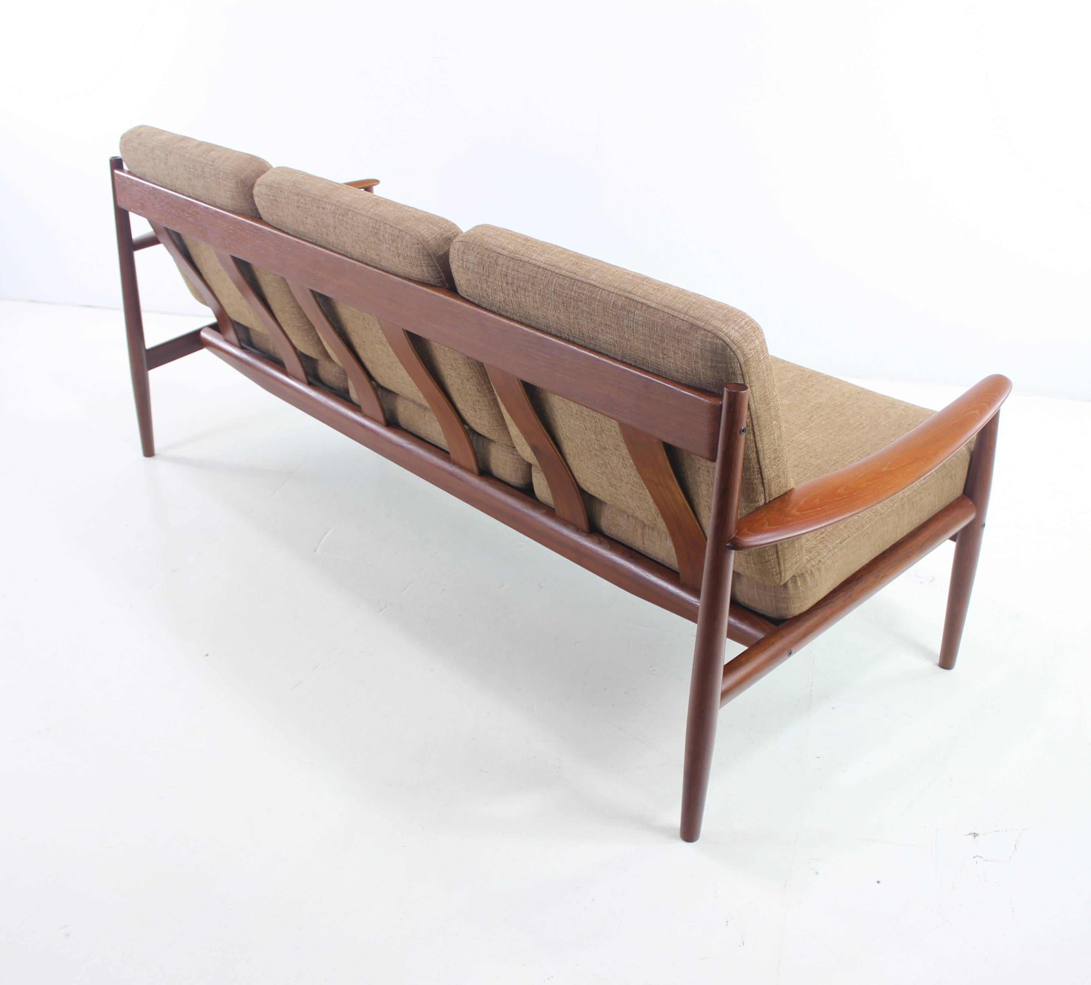 European Danish Modern Three-Place Teak Framed Sofa Designed by Grete Jalk For Sale
