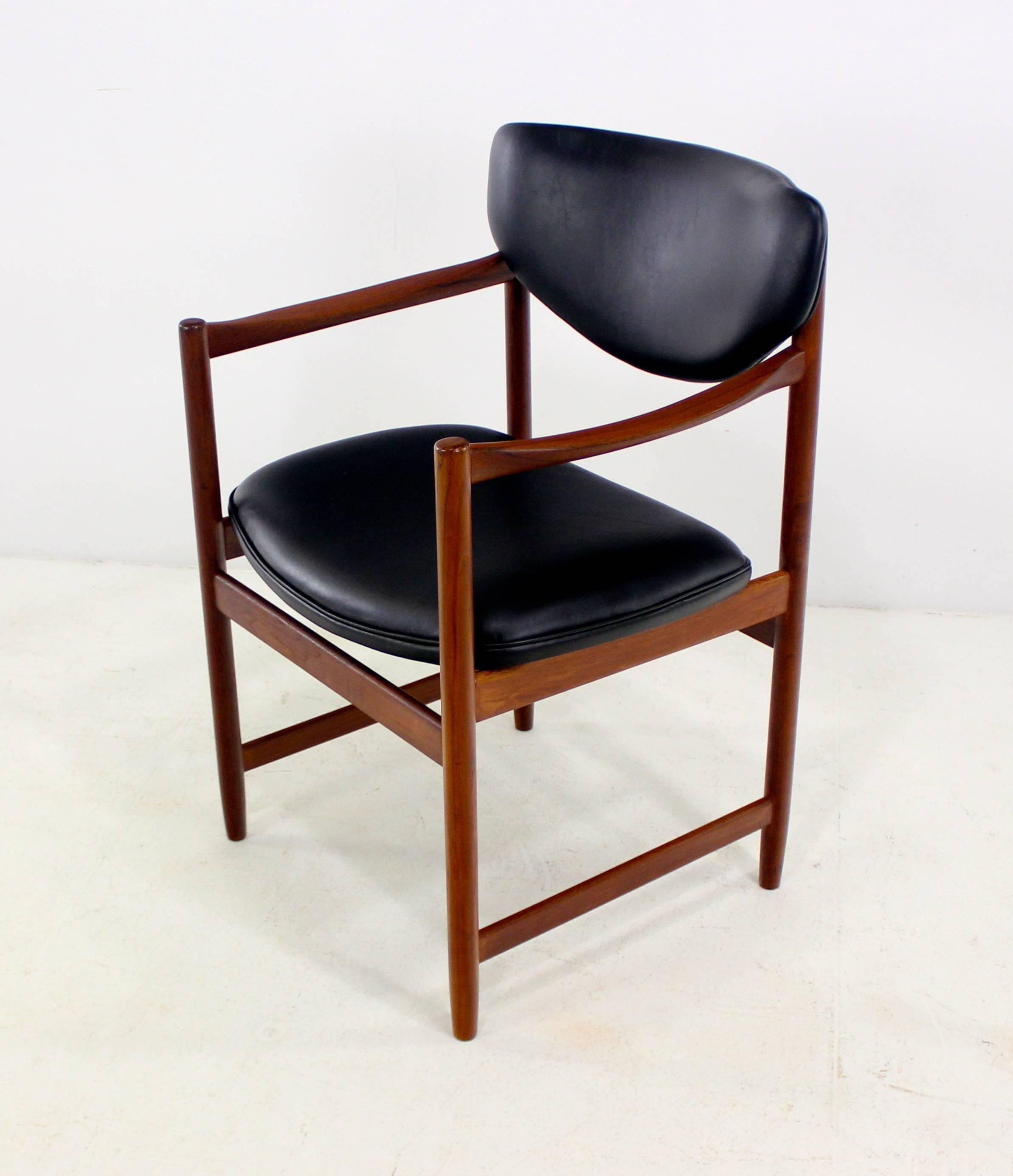 Scandinavian Modern "Throne" armchair by Westnofa.
Teak frame. Seat and back newly upholstered in highest quality black leatherette.
Professionally restored and refinished by Look Modern.
Matchless quality and price.
Low freight, quick