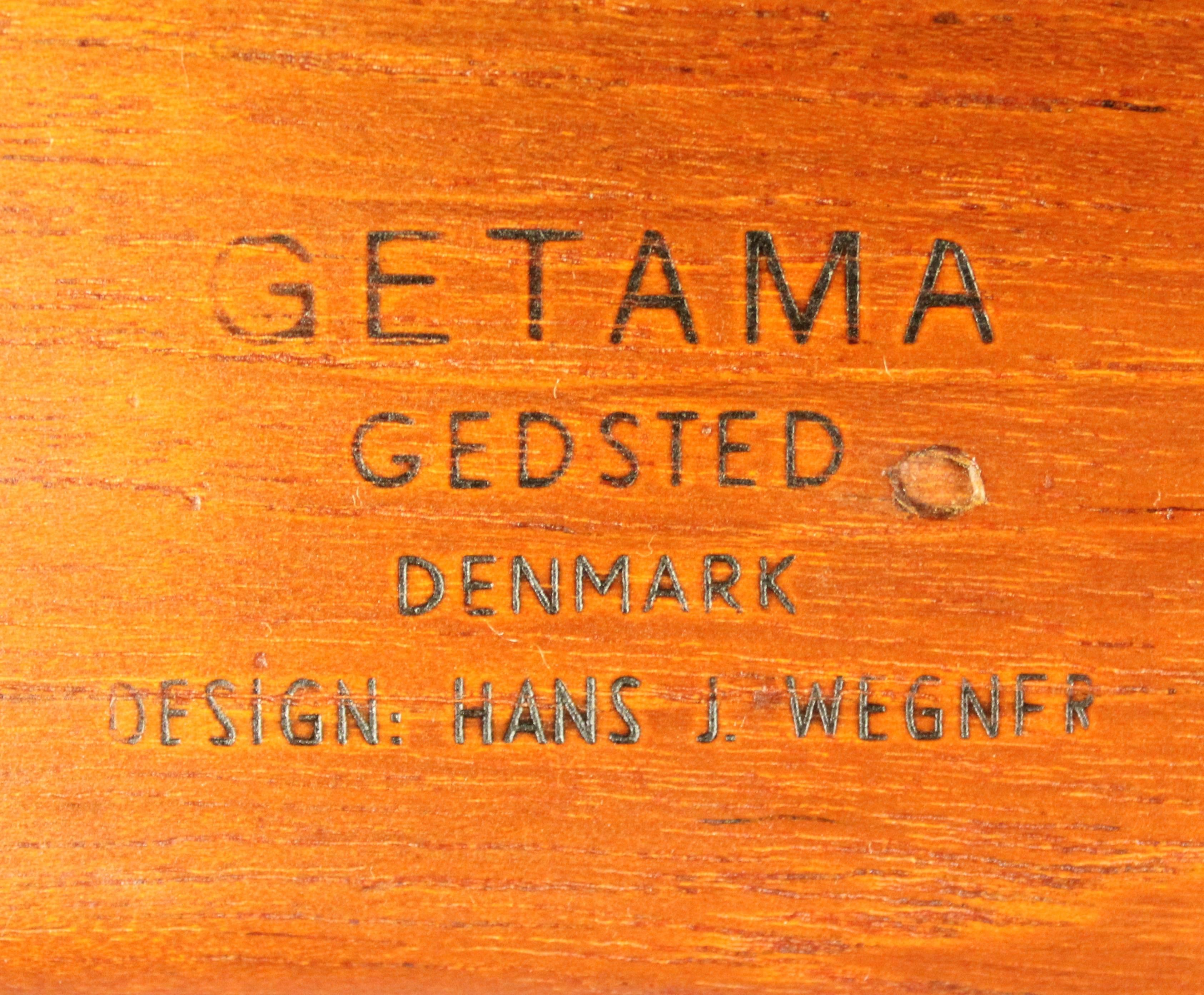 Teak Rare Pair of Danish Modern Armchairs and Ottoman Designed by Hans Wegner For Sale