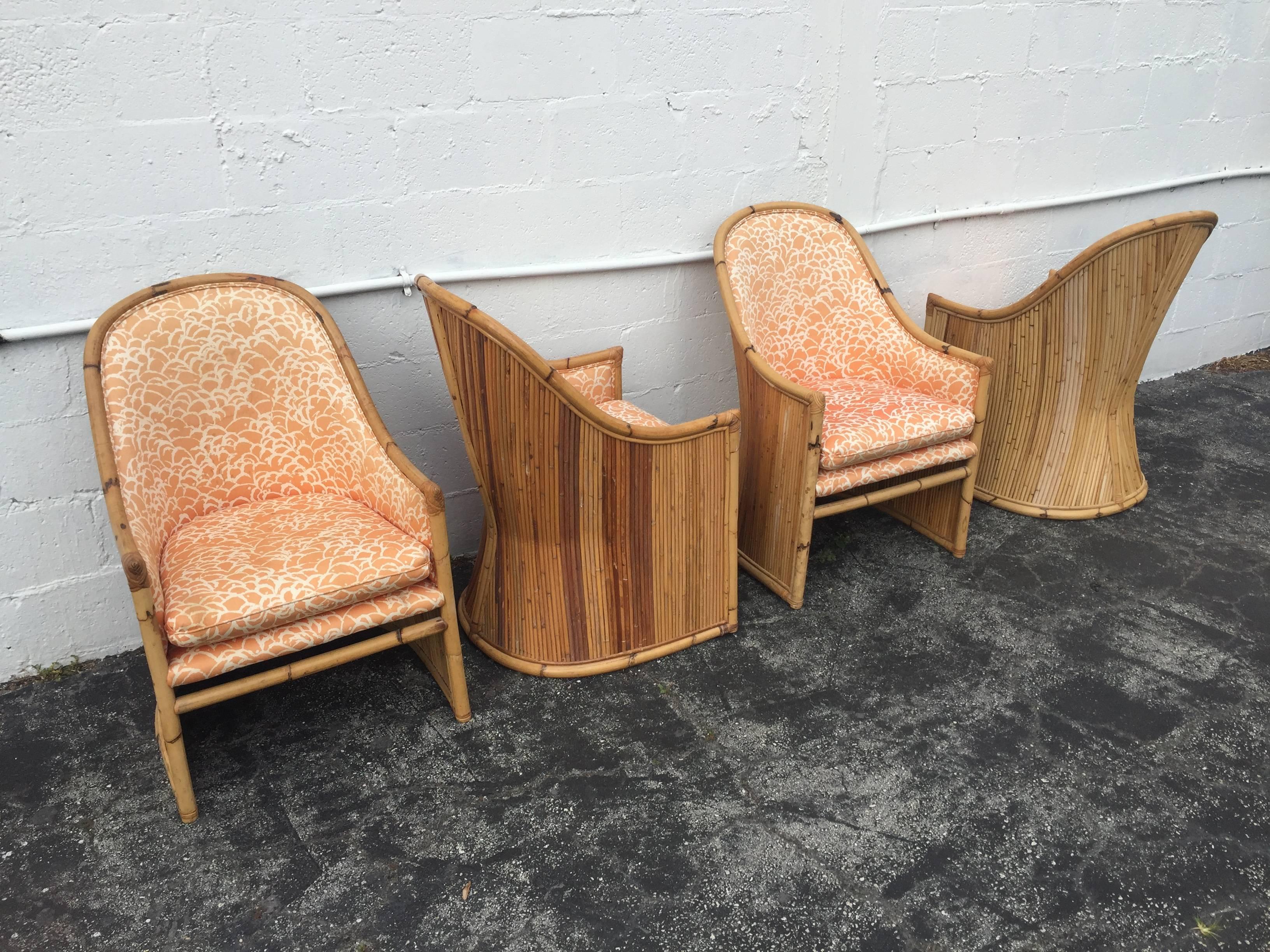 Set of four pencil rattan lounge chairs by Henry Olko for Willow and Reed.  In original upholstery.
