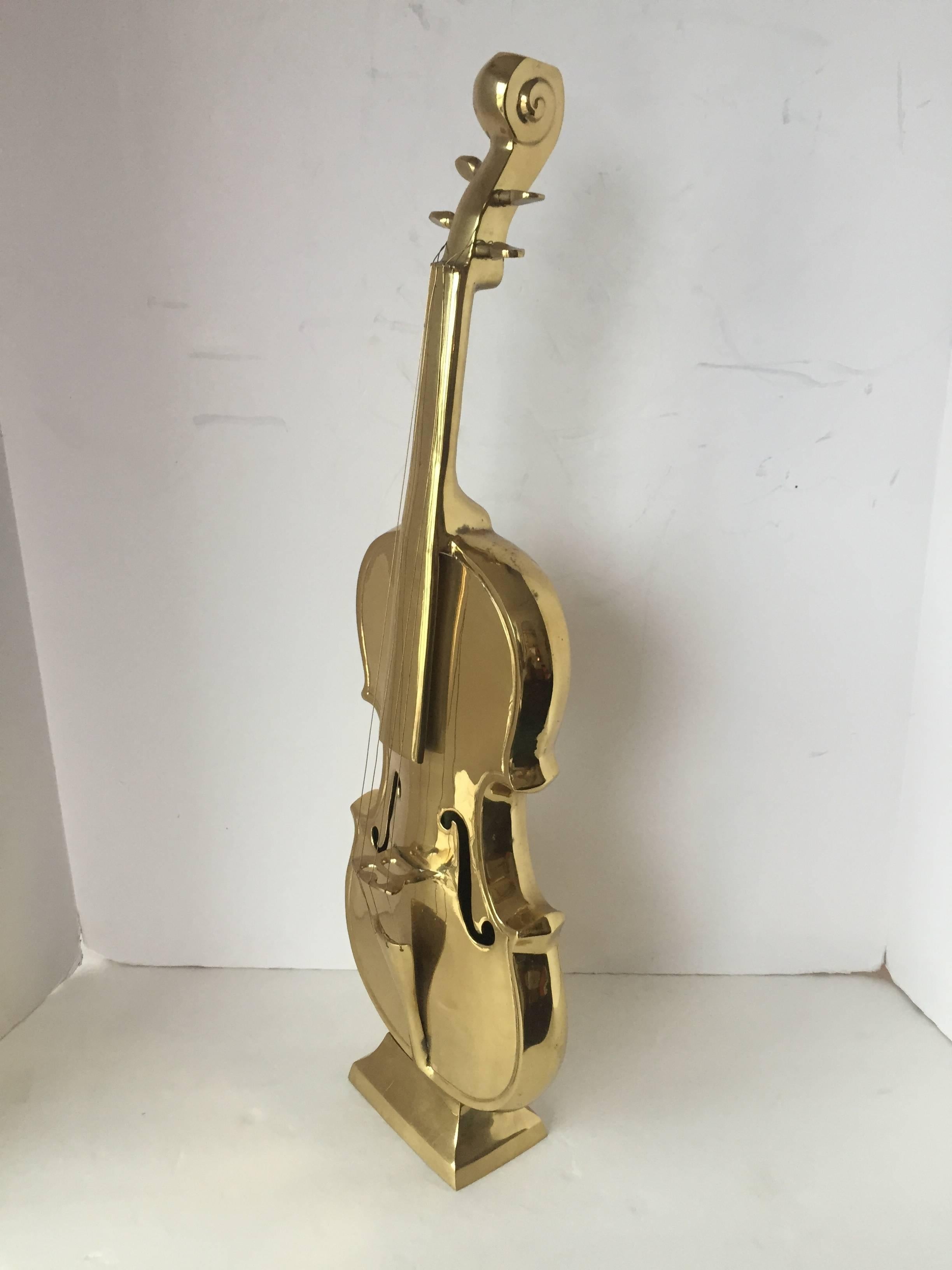 Extremely well-made, lifesize violin in brass with workable tuners and strings. Unsigned.
