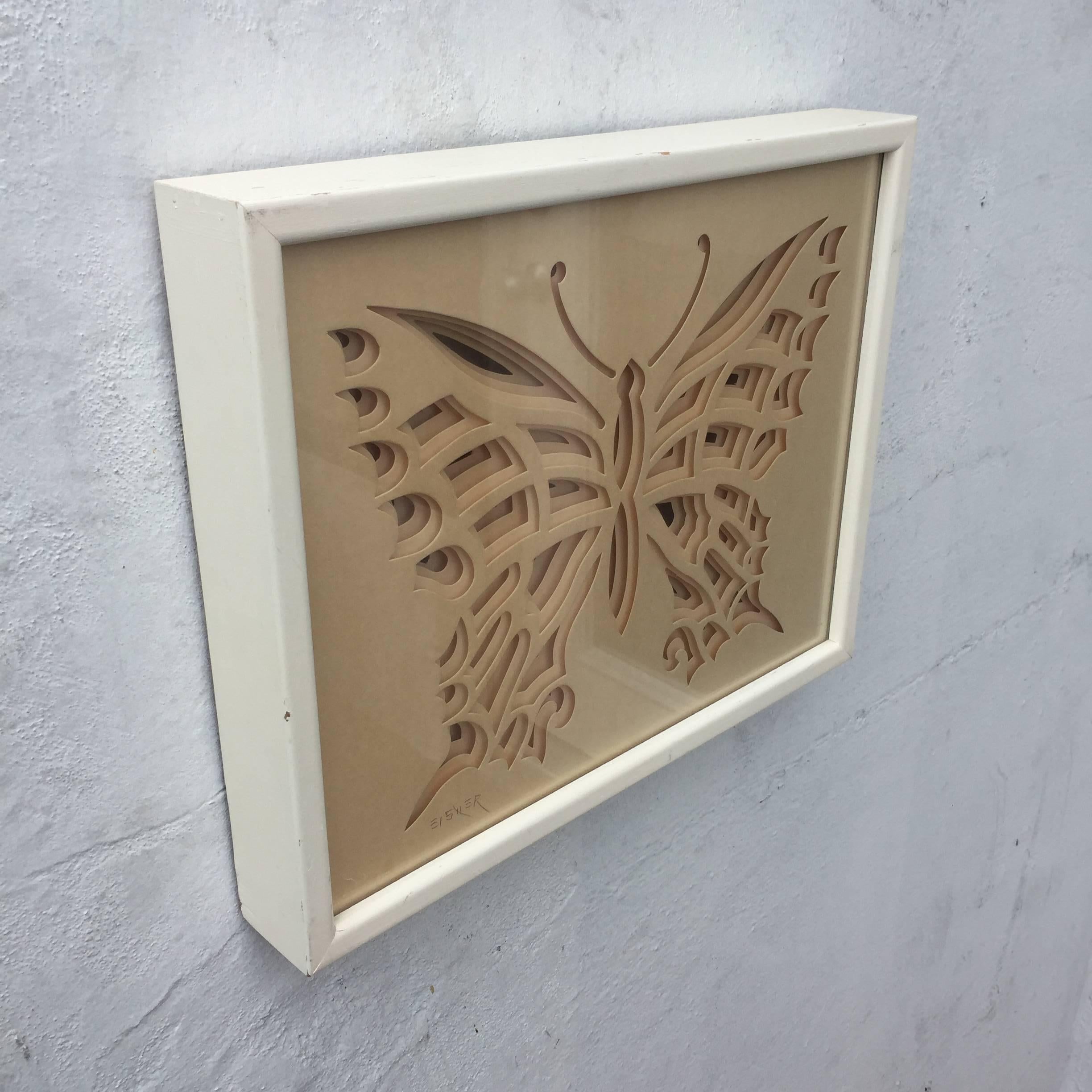 Creative three dimensional paper sculpture of a butterfly signed Eisner. In original wood frame. Signed.