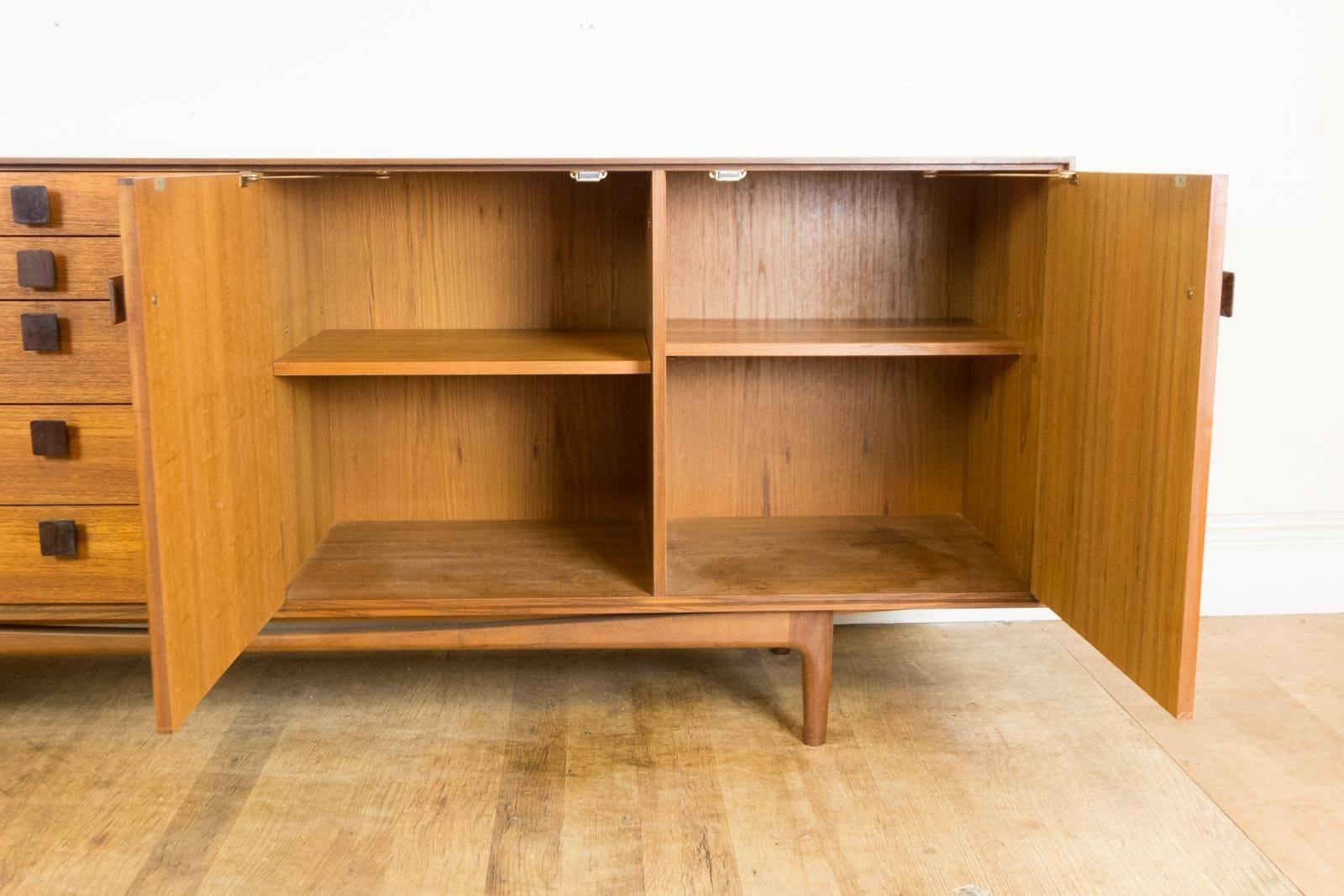 Wood Kofod Larsen Sideboard in Rosewood and Teak. For Sale