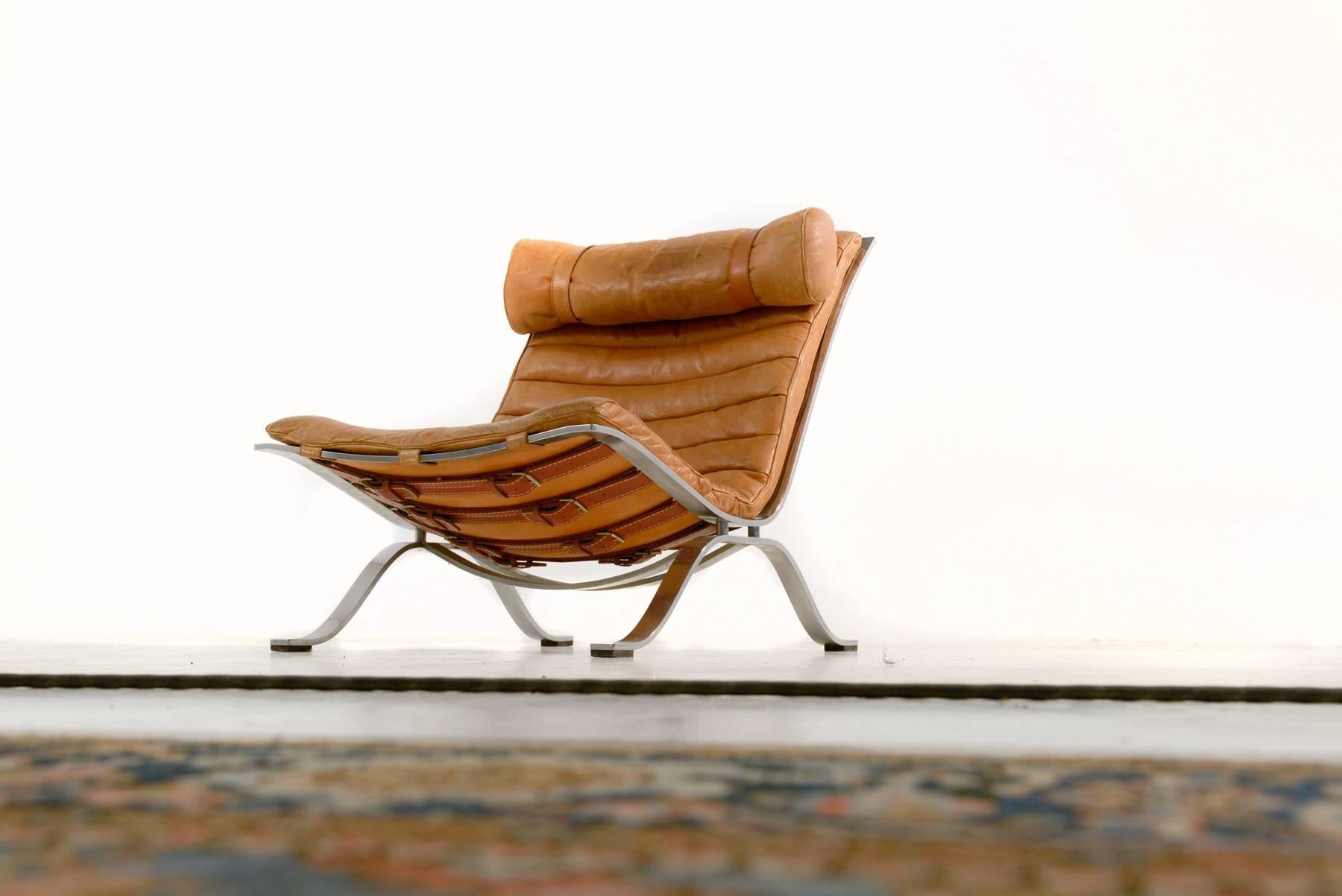 Ari chair.
Designed by Arne Norell for Norell Möbler, Sweden in 1966.
Beautiful patinated brown leather.
This award winning lounge chair was made of high quality flat chrome-plated steel and has very thick original buffalo leather.
In very good