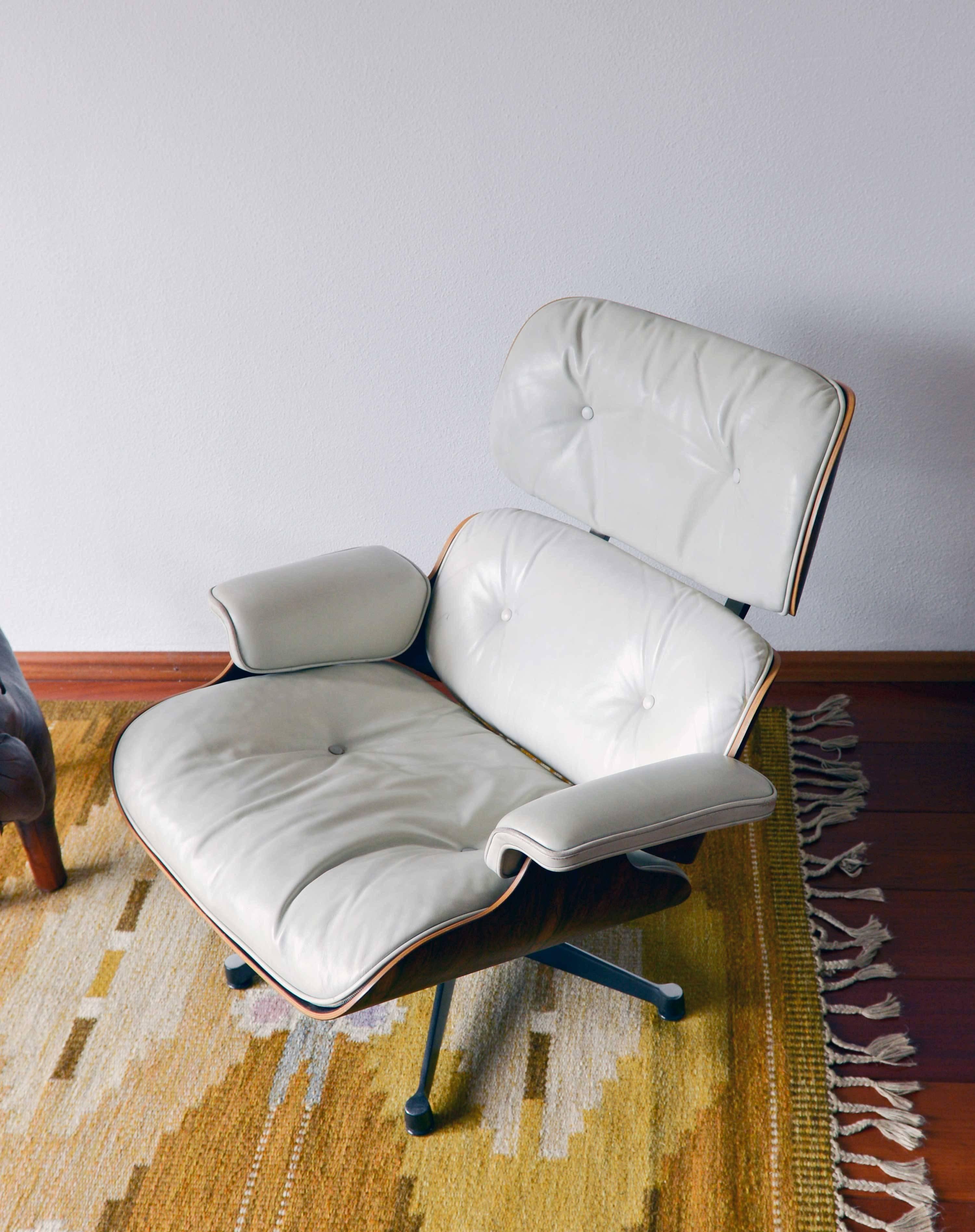 white leather eames lounge chair