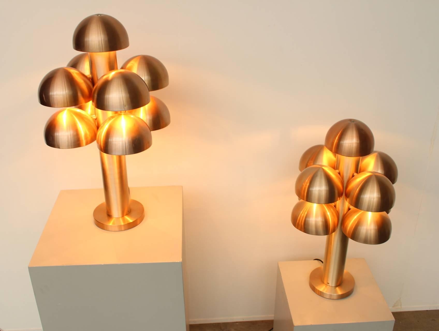 Very impressive set of mushroom shaped table lamps called Cantharelle by Finnish designer Maija Liisa Komulainen for the Dutch firm Raak Amsterdam in 1972. Both lamps are identical, in very good condition and all 9 light sources on each lamp