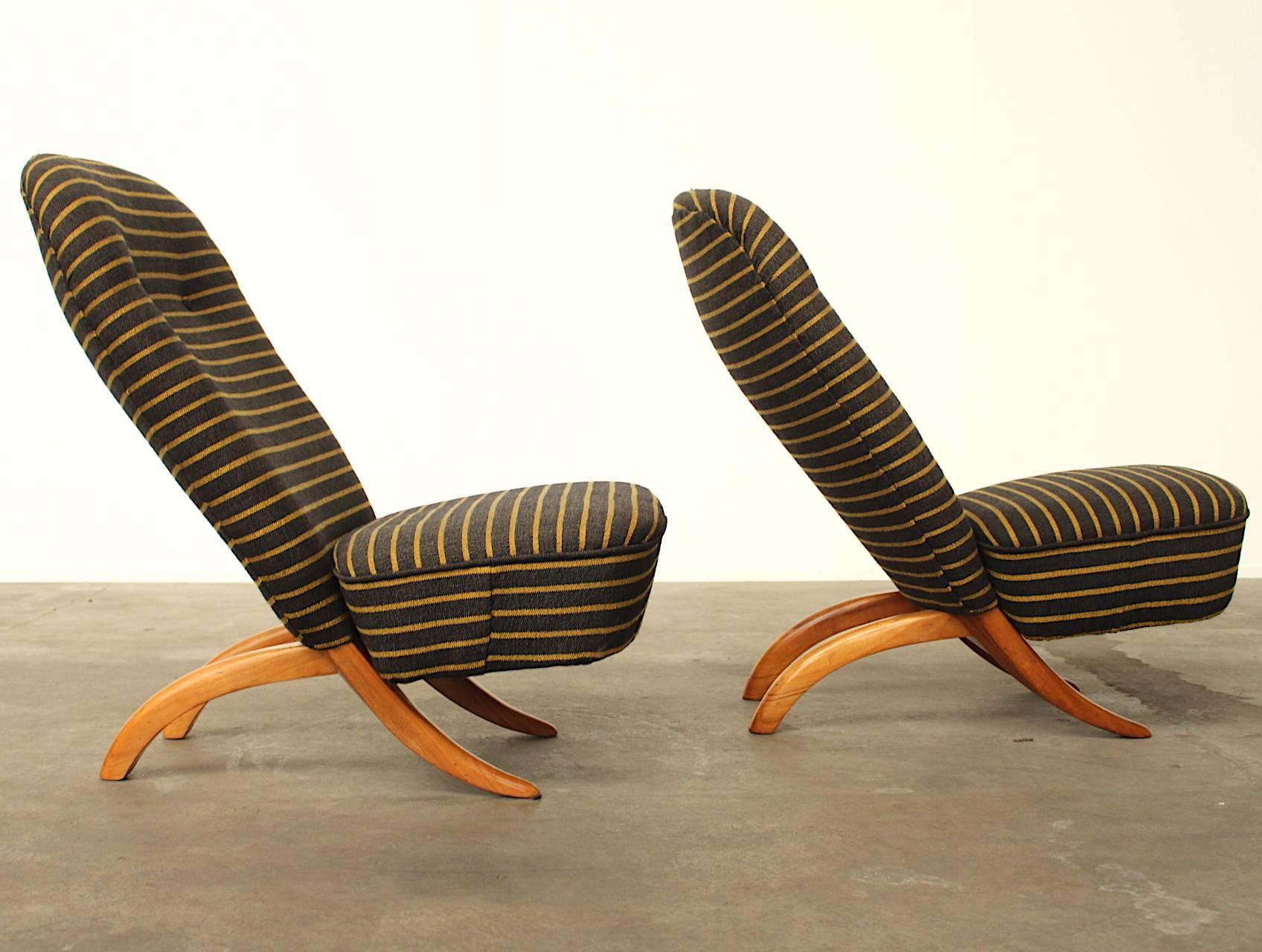 Beautiful pair of iconic easy chairs named 