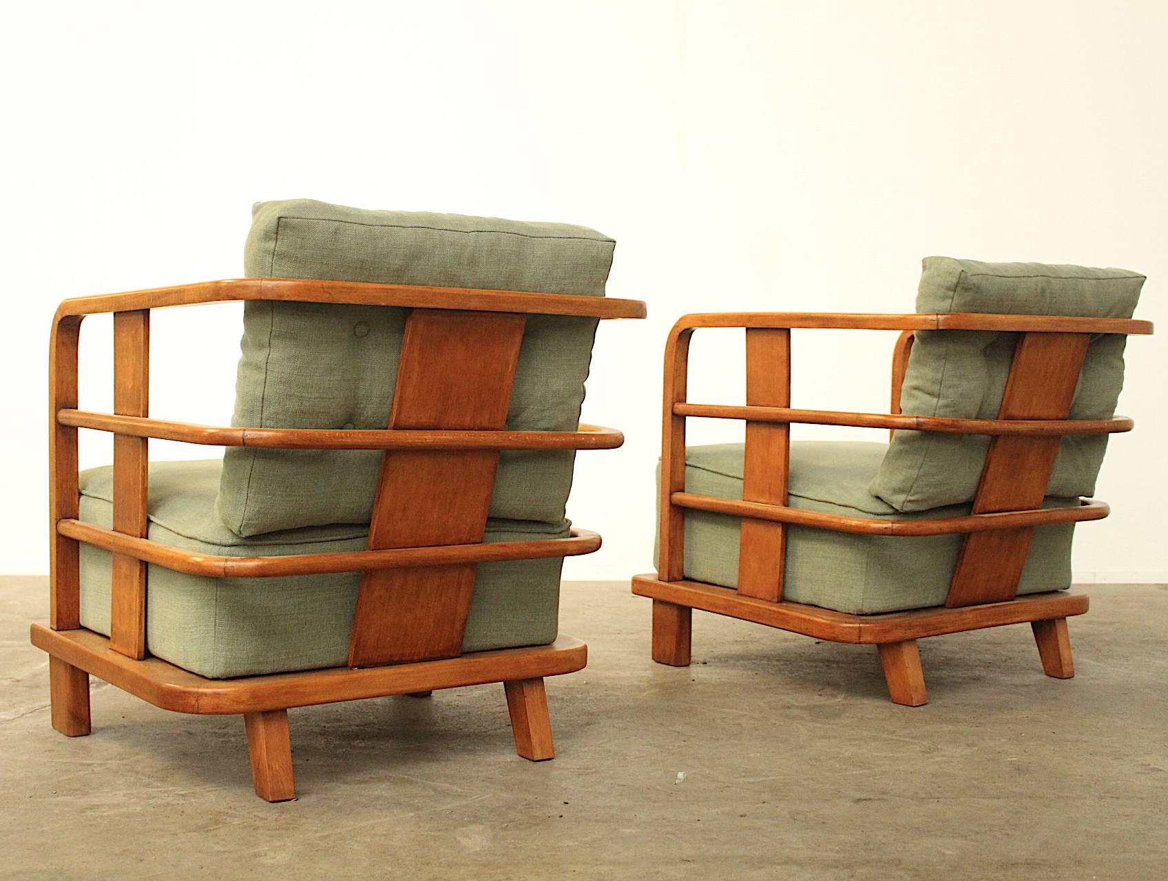 French Pair of Arm Chairs Easy Chairs, attributed to Jean Royere, France mid 1940's