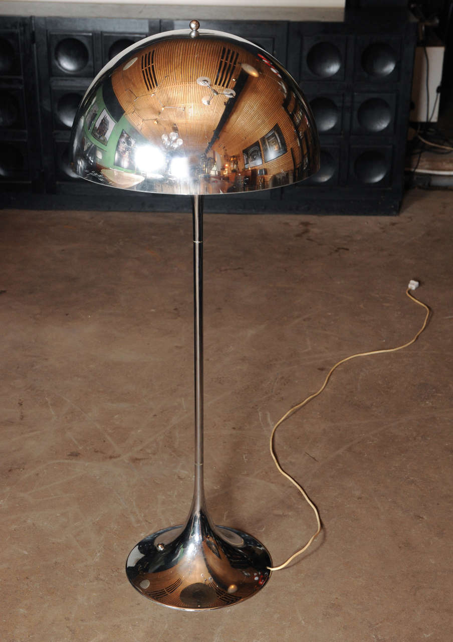 Extremely rare chromed version of the Panthella floor light by Danish designer Verner Panton manufactured by Louis Poulsen. Originally marked 'Poulsen' on the base.
The shape is often described as 'mushroom-like', it is however more precisely
