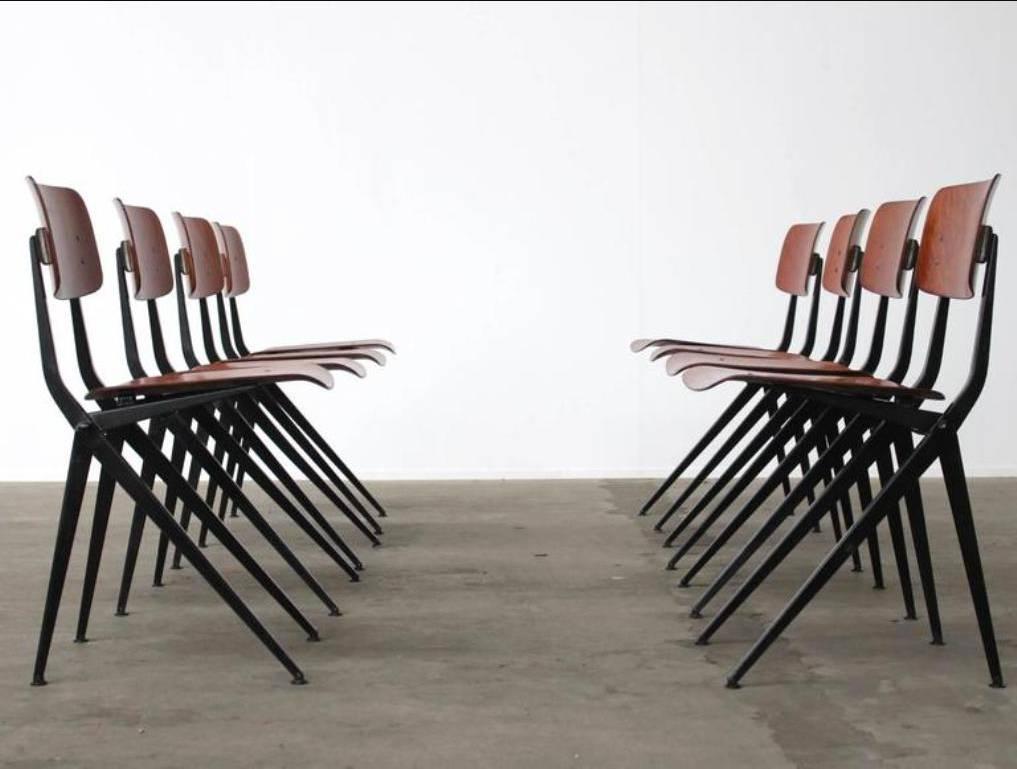 Set of 6 stunning Industrial dining chairs by Dutch industrial design brand Marko. The steel frame has the elegant compass shape with an obvious connection to the industrial style of designs by Jean Prouvé and Gerrit Rietveld. This is the rarest and